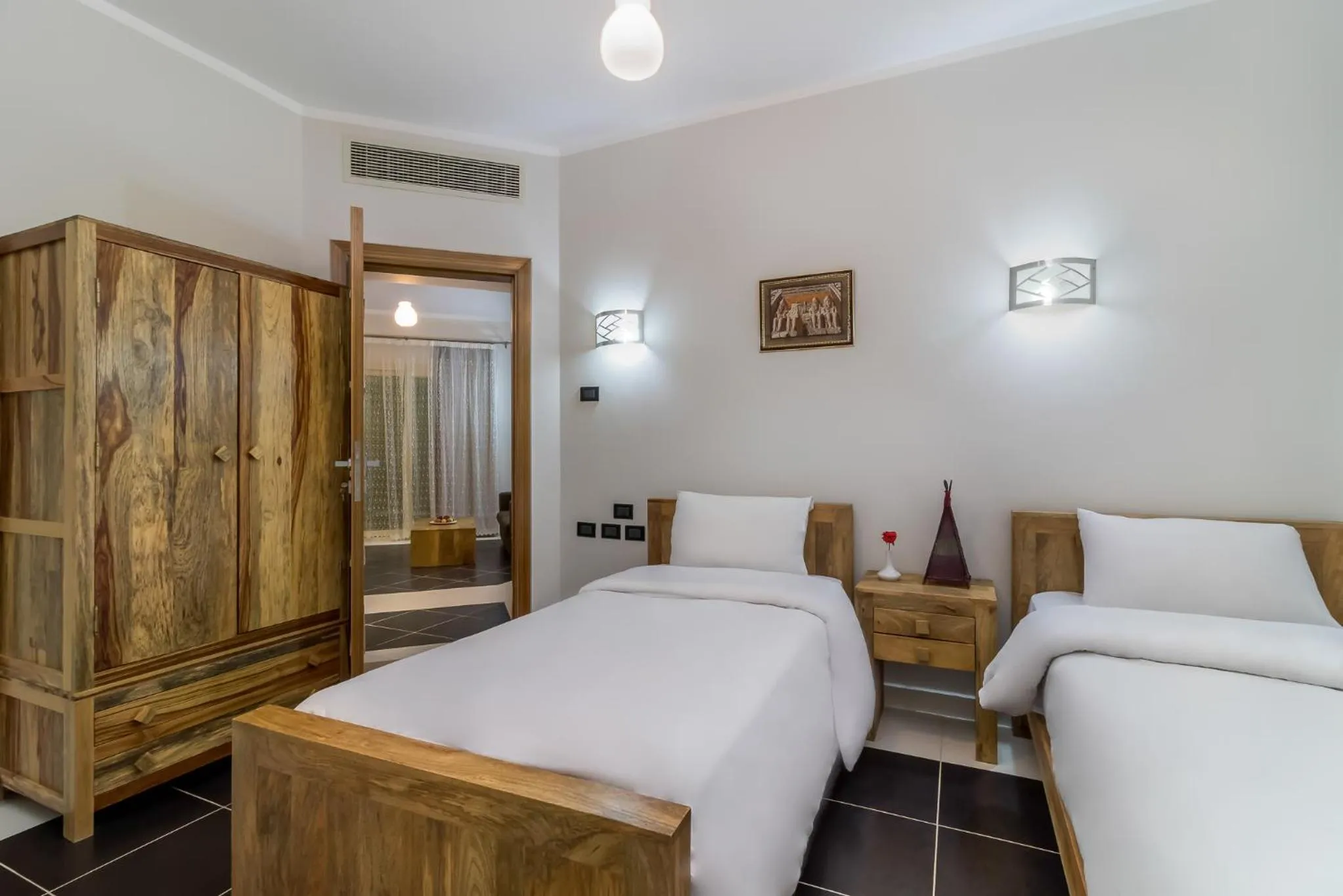 Bed in Royal Beach Serviced Apartments