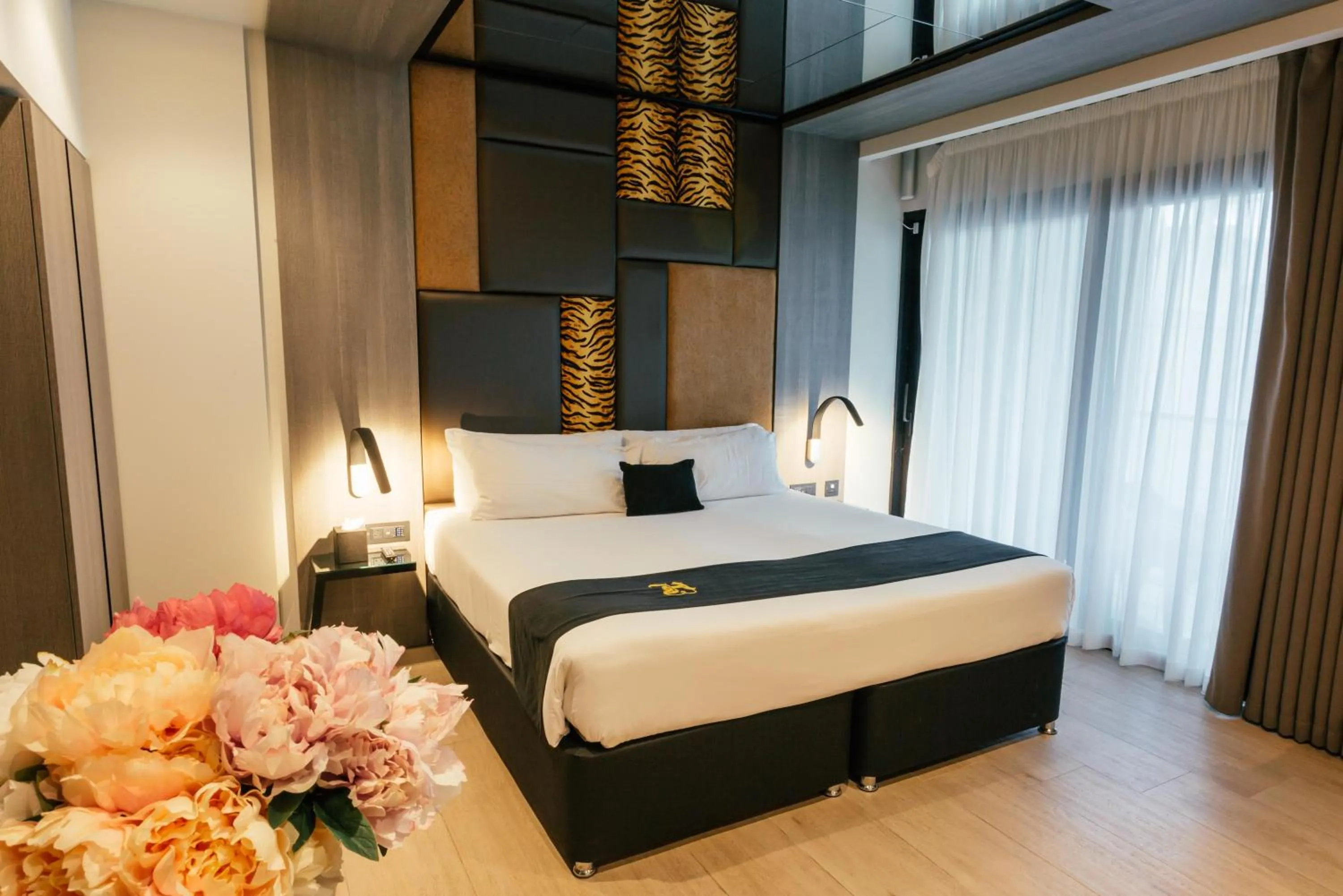 Bedroom, Bed in Hugo's Boutique Hotel - Adults Only