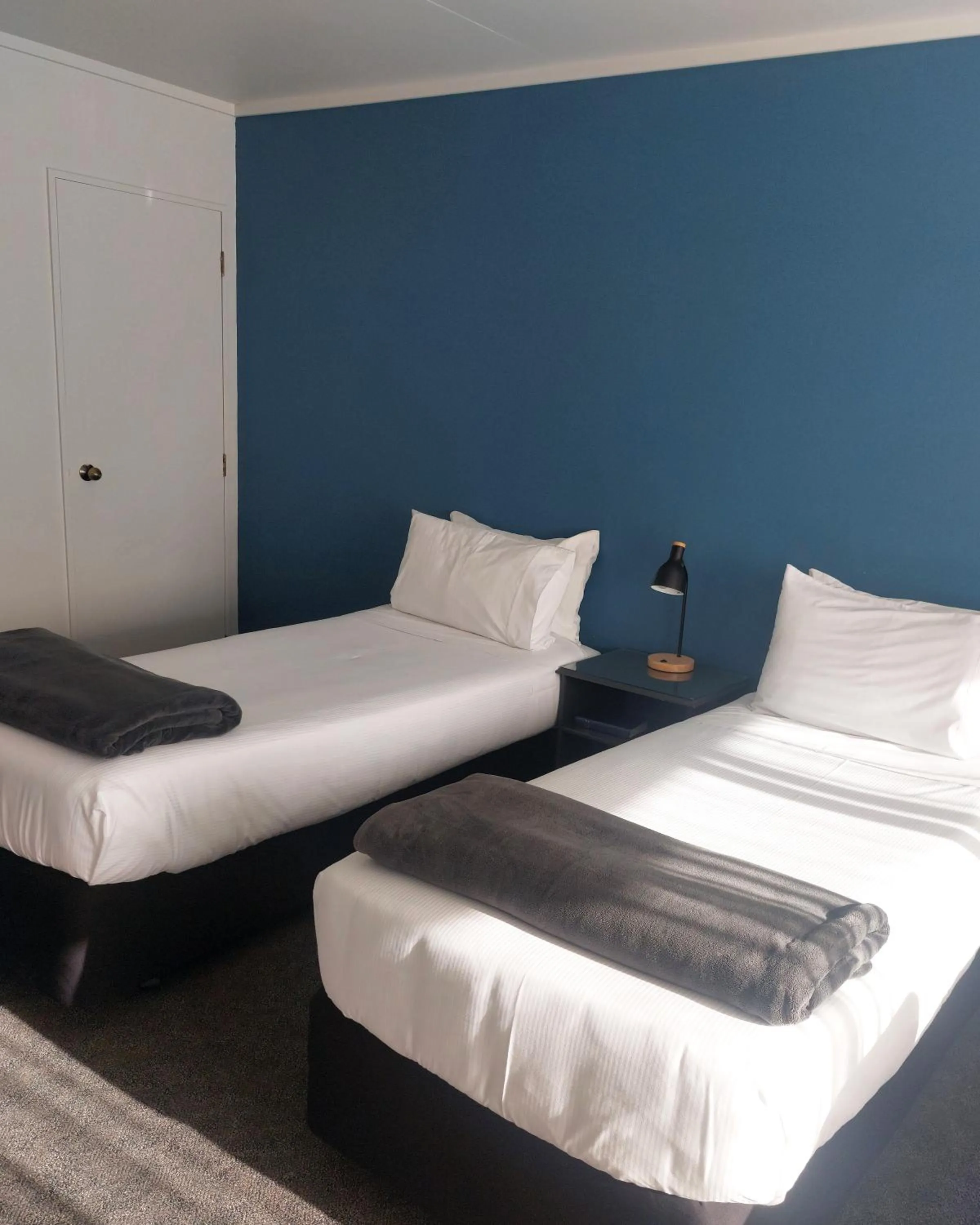 Bed in Lake Dunstan Motel