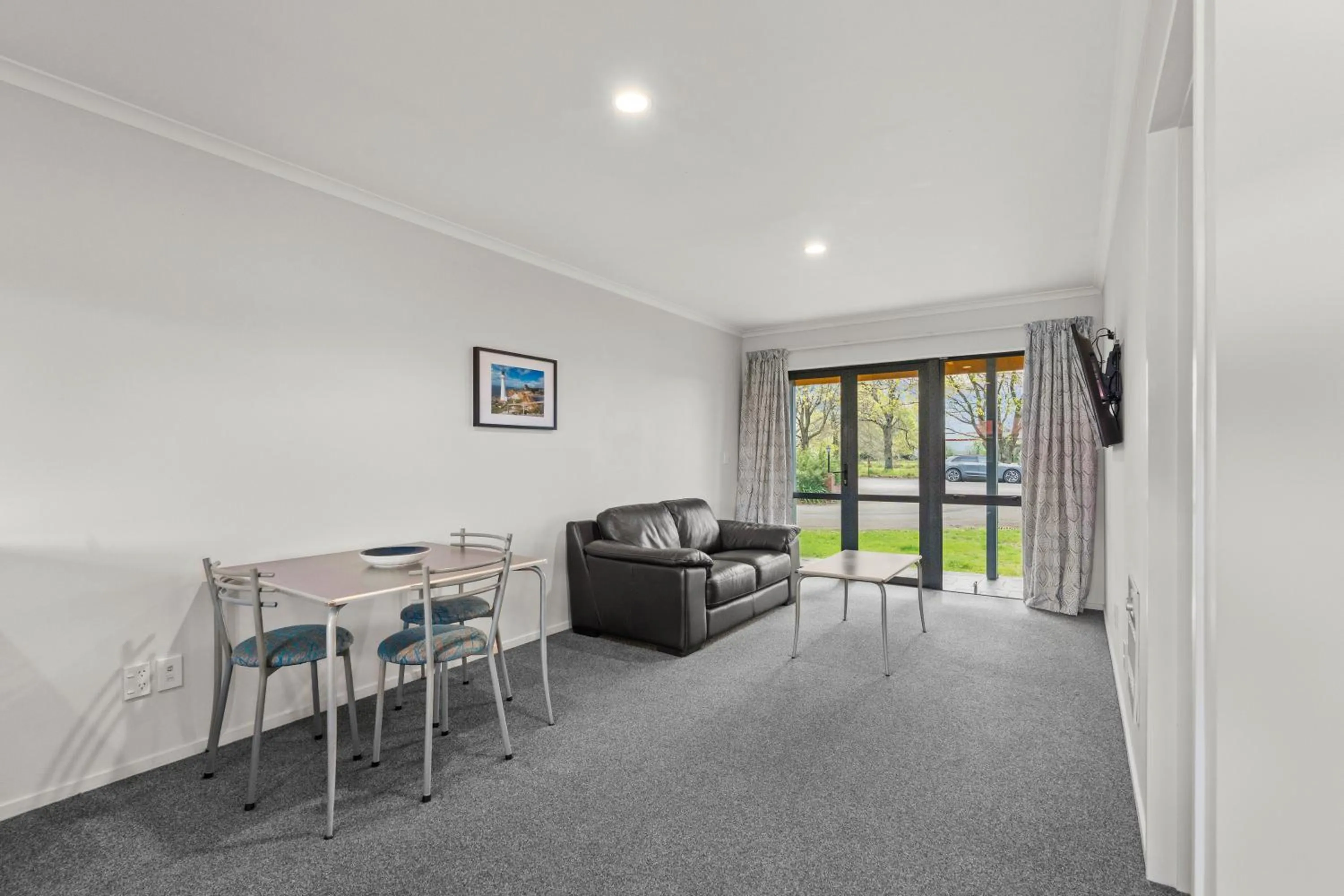 Seating area in ASURE Oak Estate Motor Lodge