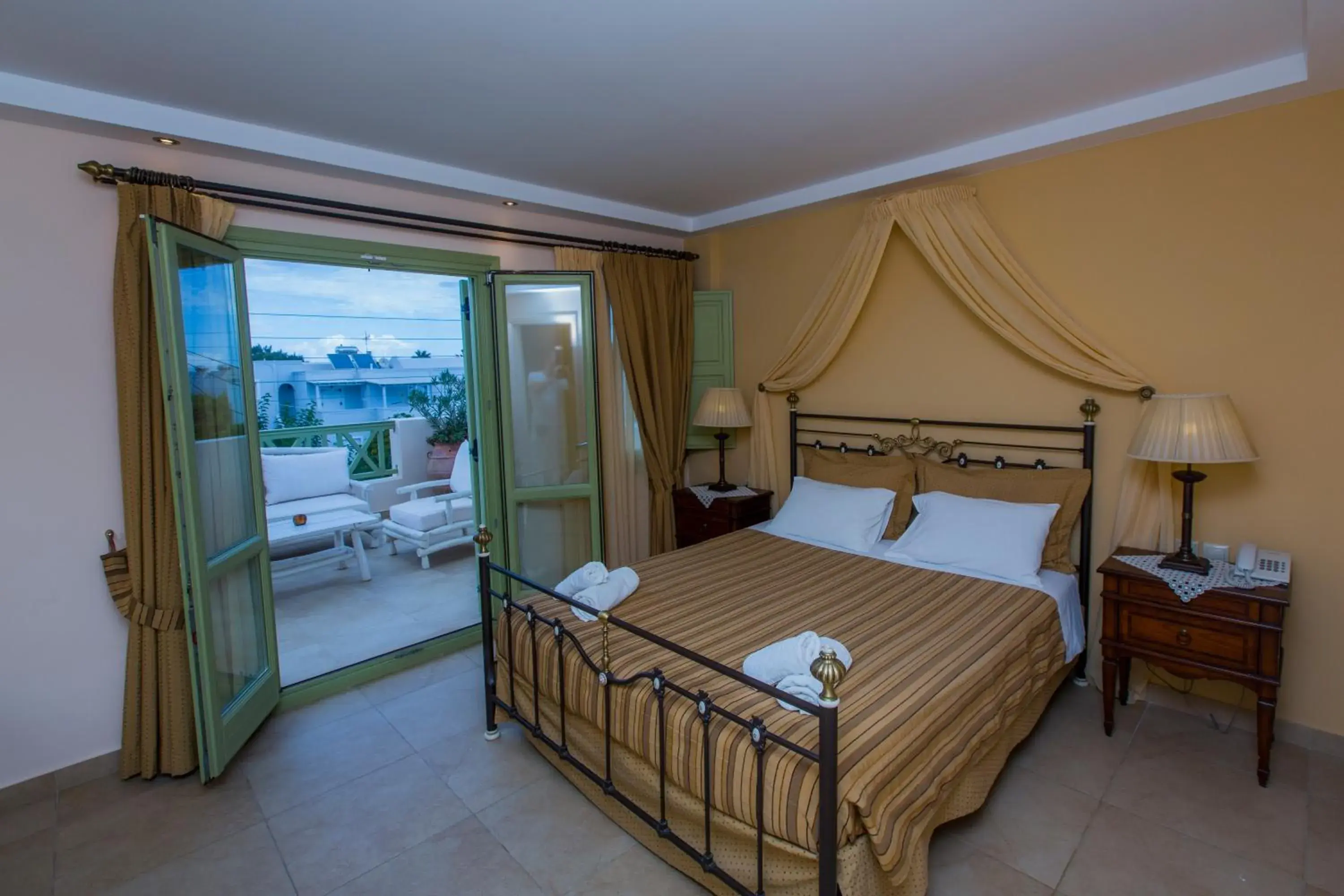 View (from property/room), Bed in Anassa Deluxe Suites View (from property/room), Bed in Anassa Deluxe Suites