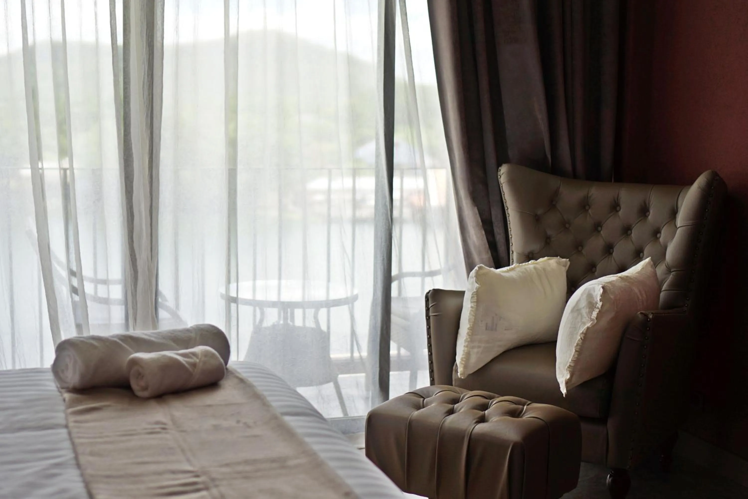 Seating area, Bed in The Glory River Kwai Hotel