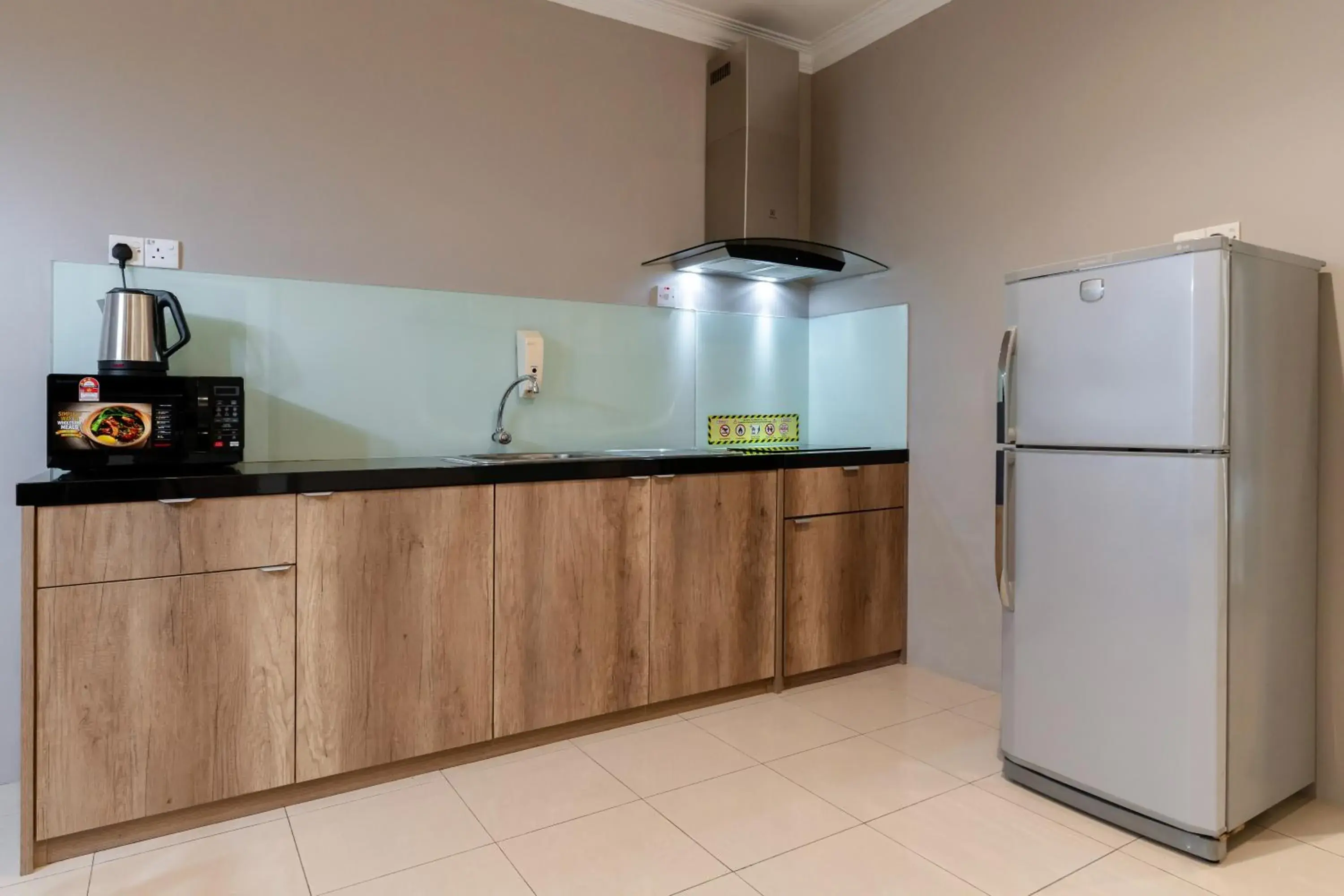 Kitchen or kitchenette in Golden View Serviced Apartments Kitchen or kitchenette in Golden View Serviced Apartments