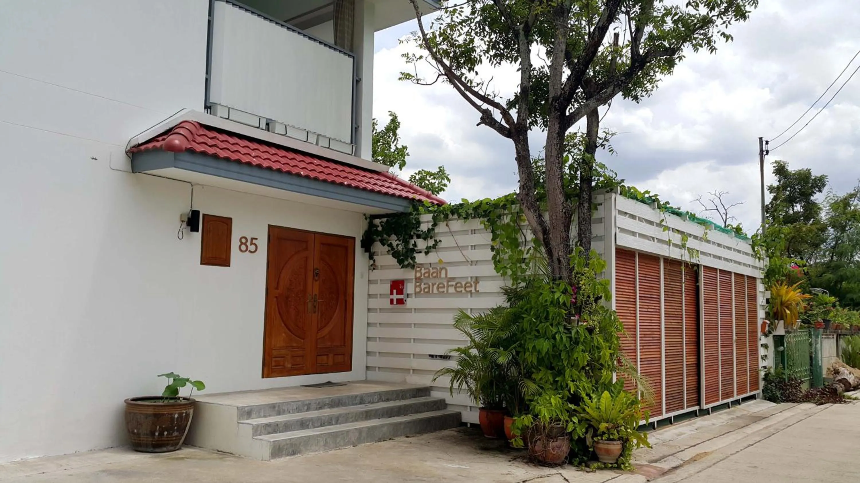 Facade/entrance in Barefeet Naturist Resort