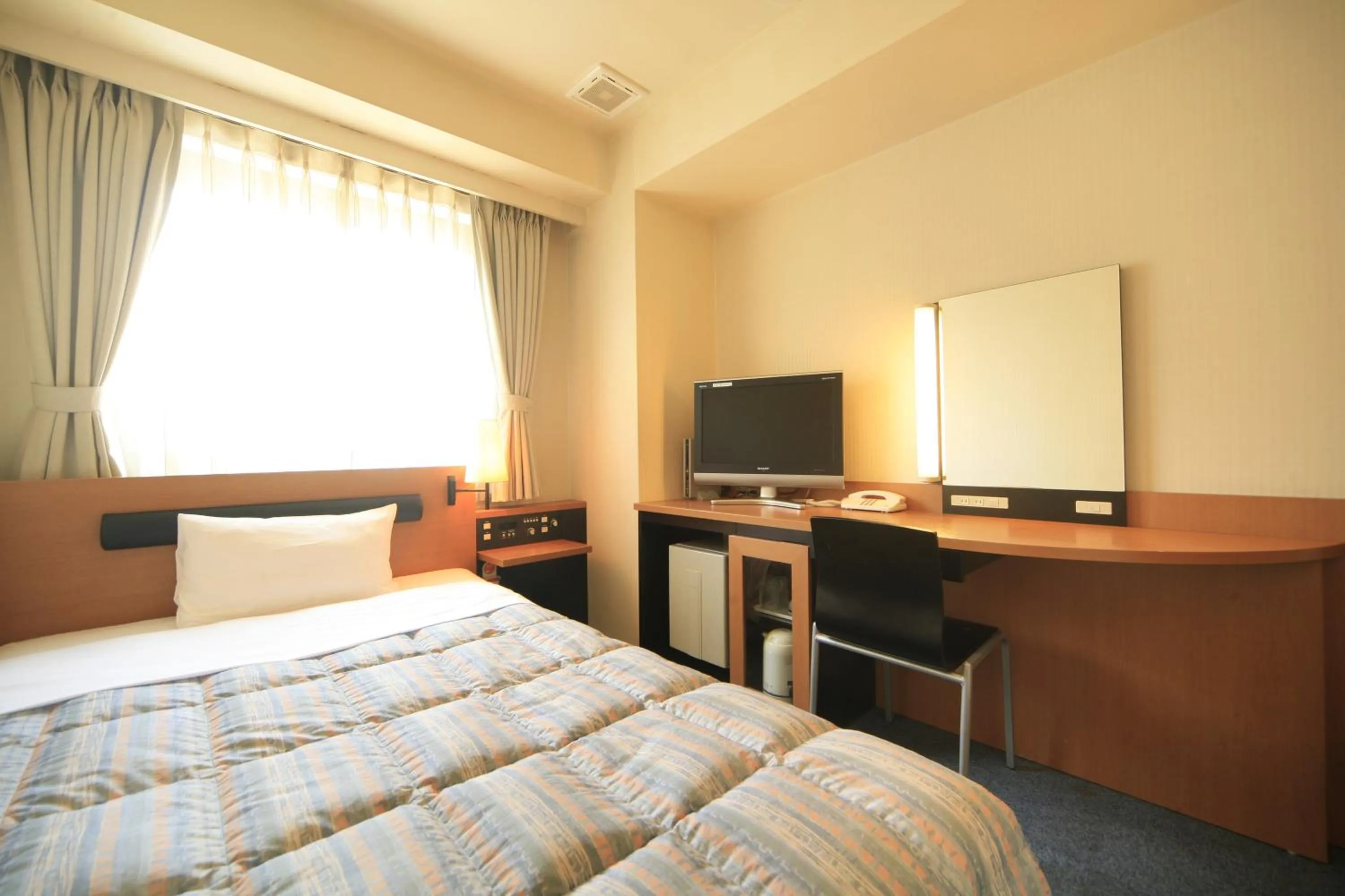 Photo of the whole room, TV/Entertainment Center in Via Inn Hiroshima Kanayamacho