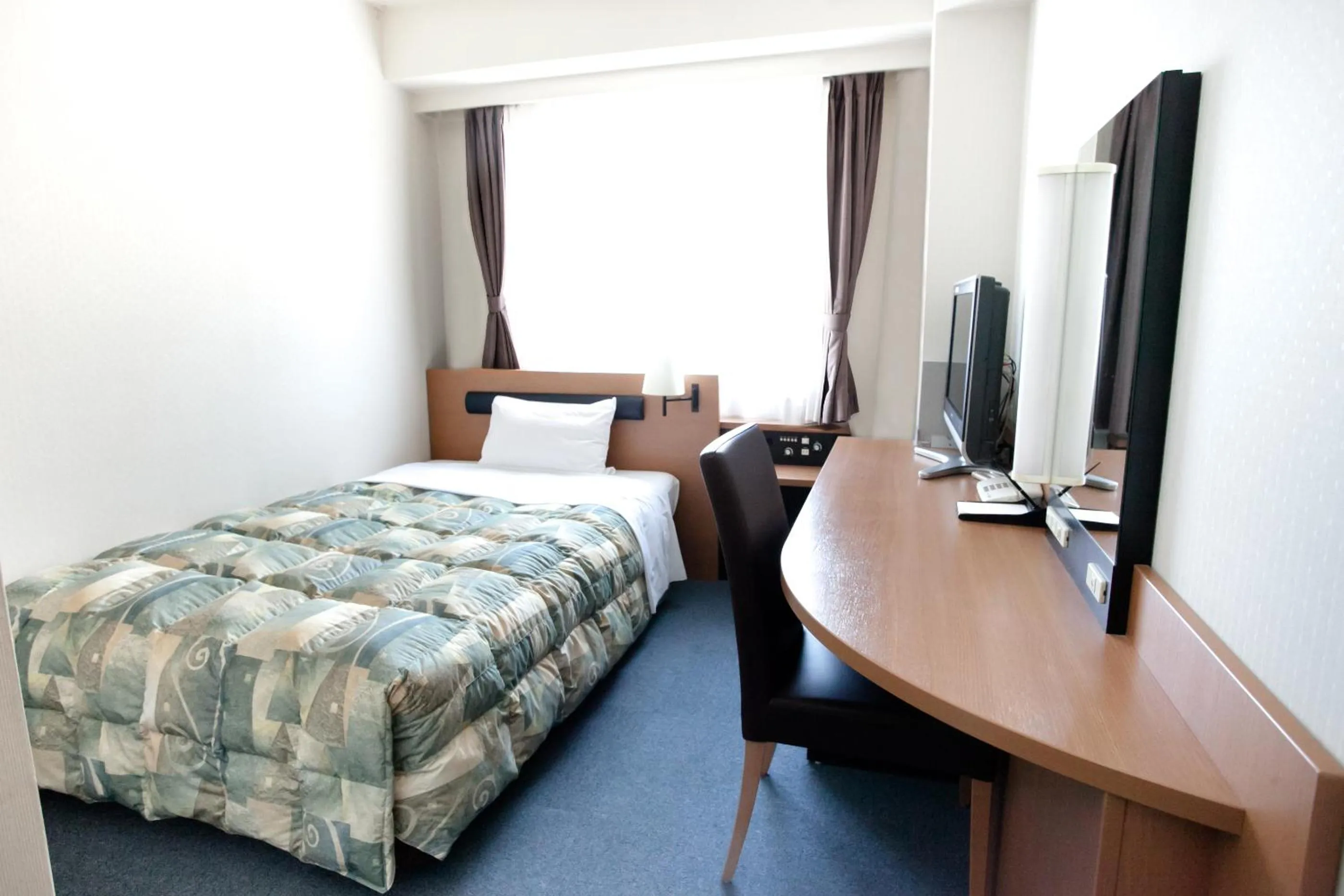 Photo of the whole room, TV/Entertainment Center in Via Inn Hiroshima Kanayamacho