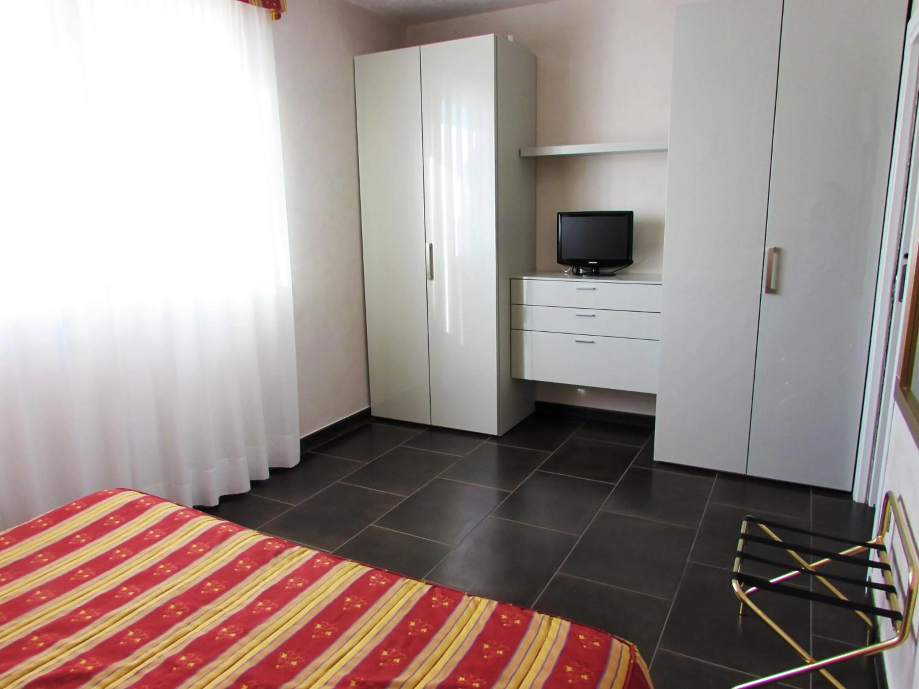 Decorative detail, Bed in Hotel Dante Residence