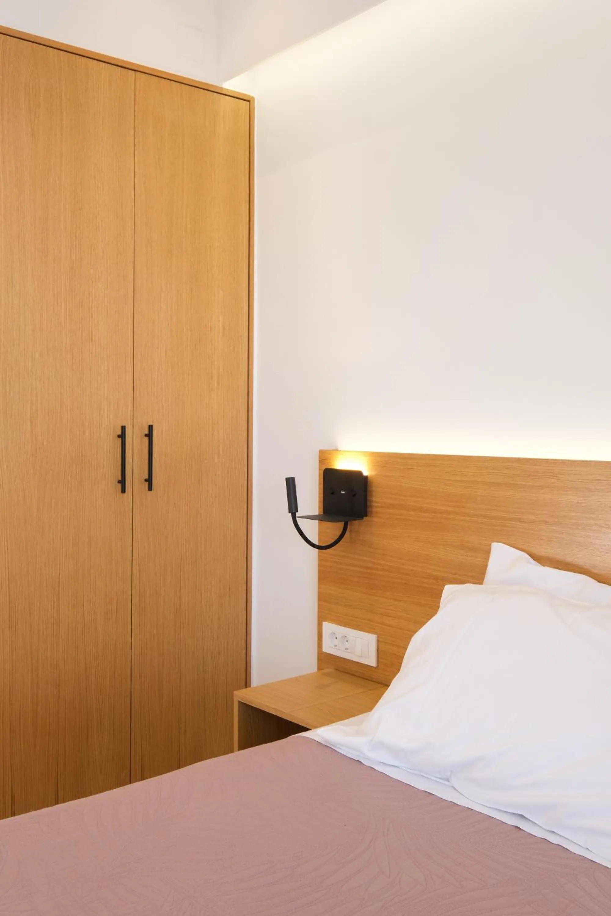 Bed in Arocaria Apartments