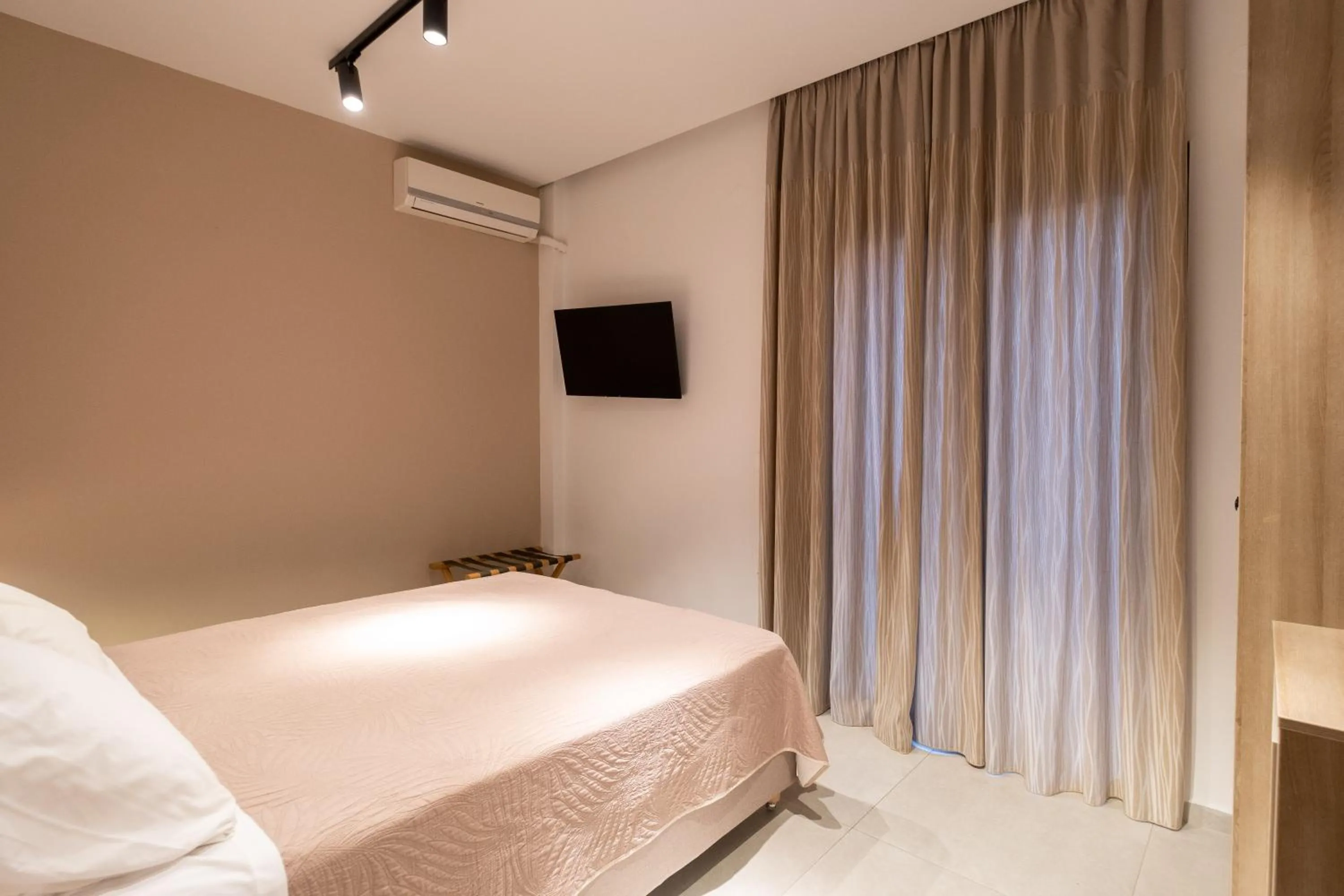 Bed in Arocaria Apartments