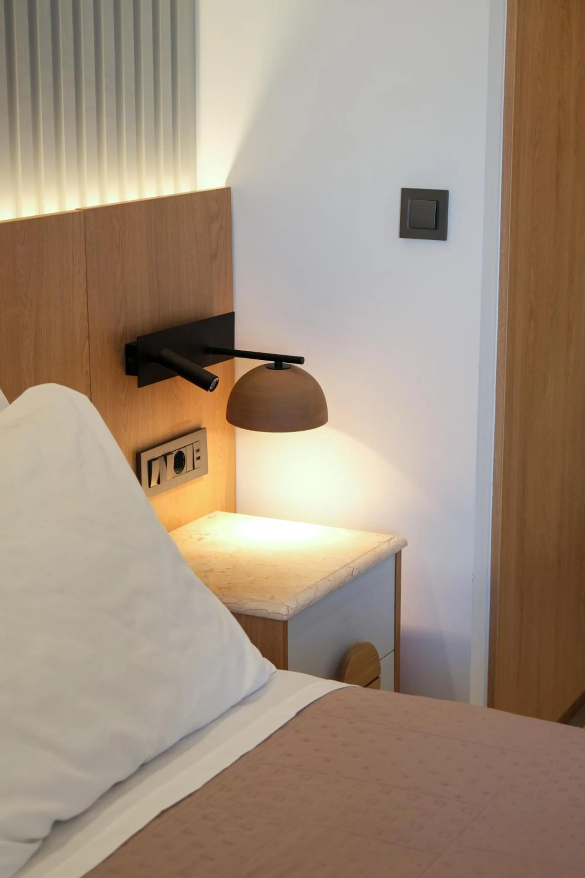 Bed in Arocaria Apartments