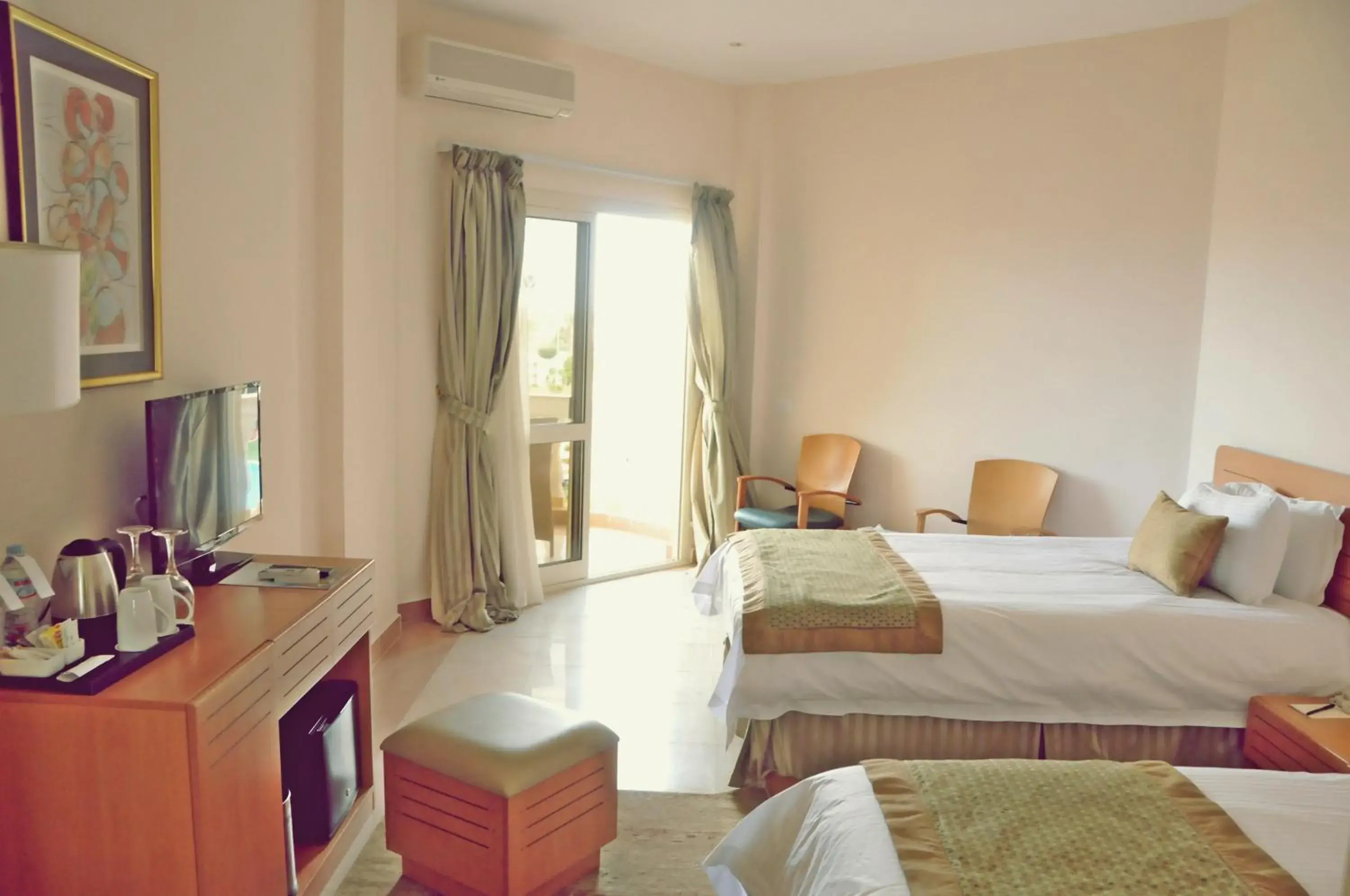 Deluxe Twin Room with Pool View in Tolip Family Club Borg El Arab Deluxe Twin Room with Pool View in Tolip Family Club Borg El Arab