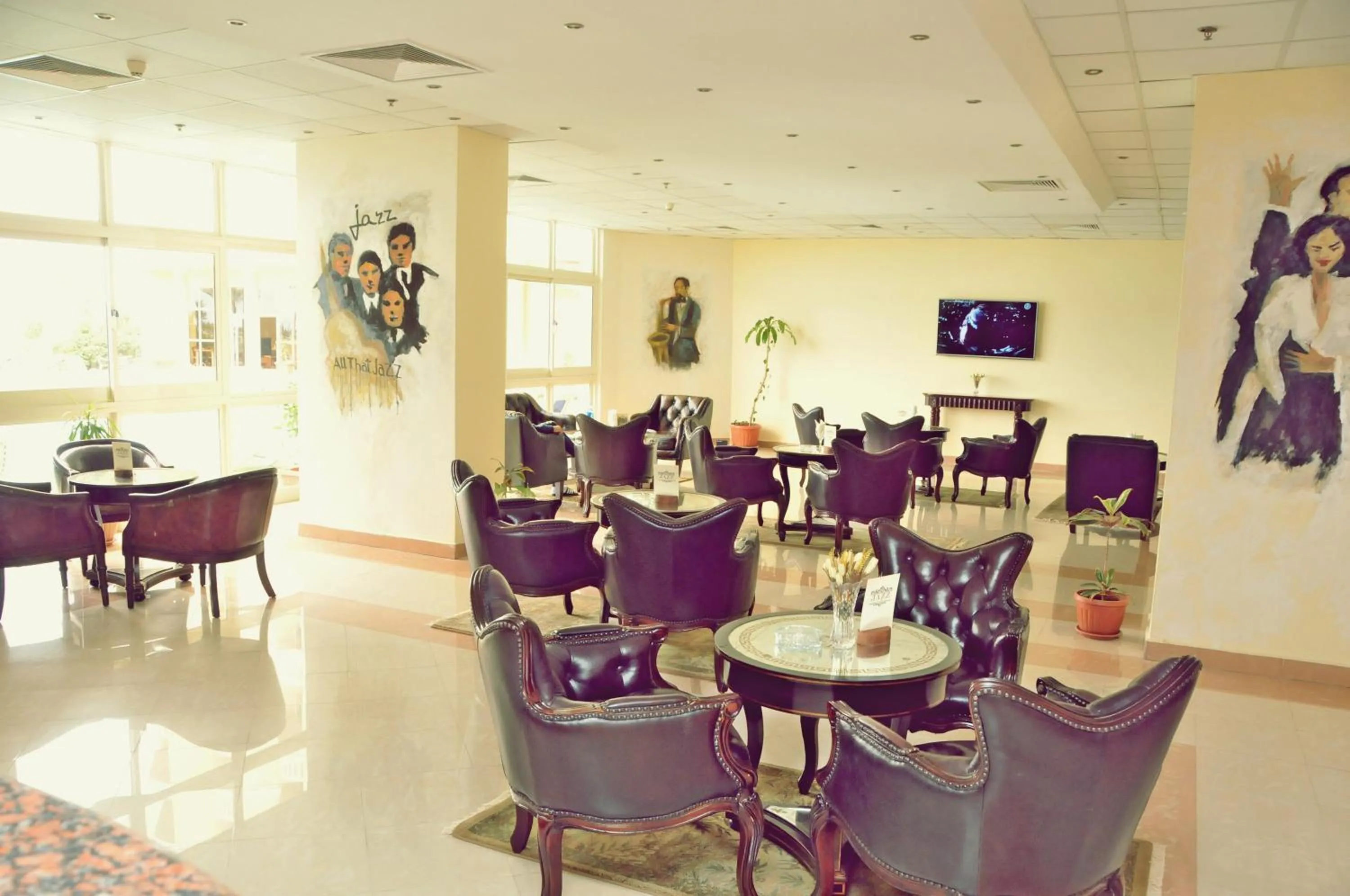 Lounge or bar in Tolip Family Club Borg El Arab