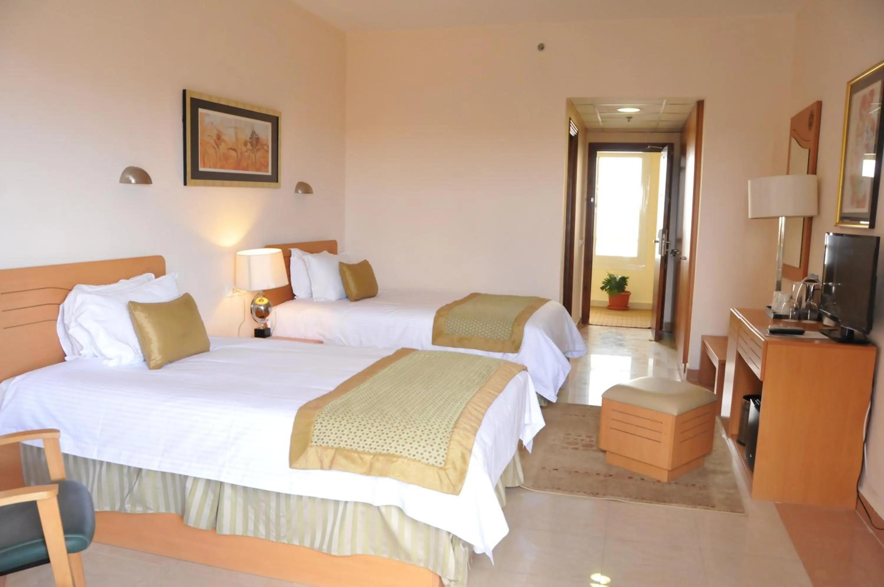 Bedroom, Bed in Tolip Family Club Borg El Arab