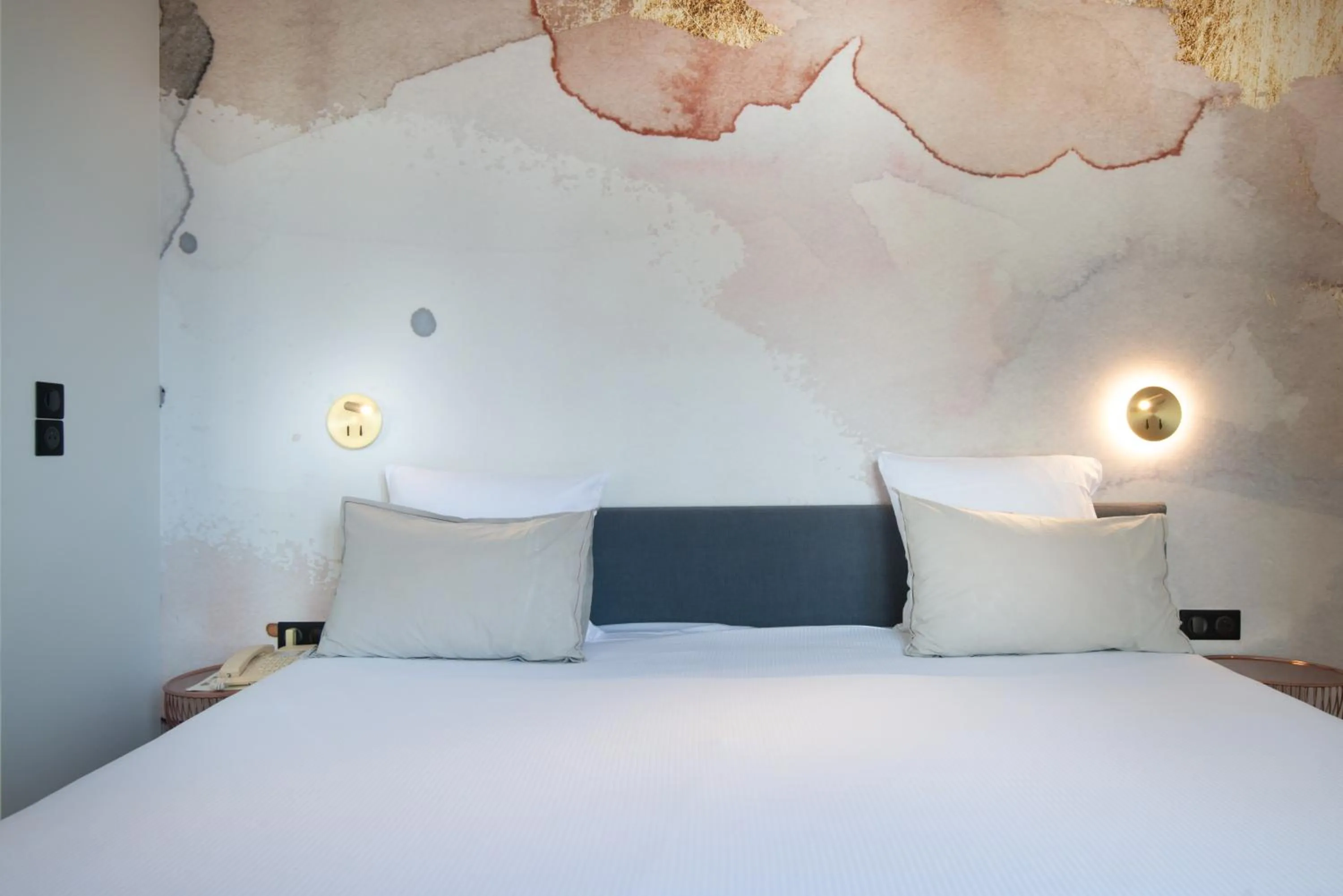 Bed in Hôtel de la Cité