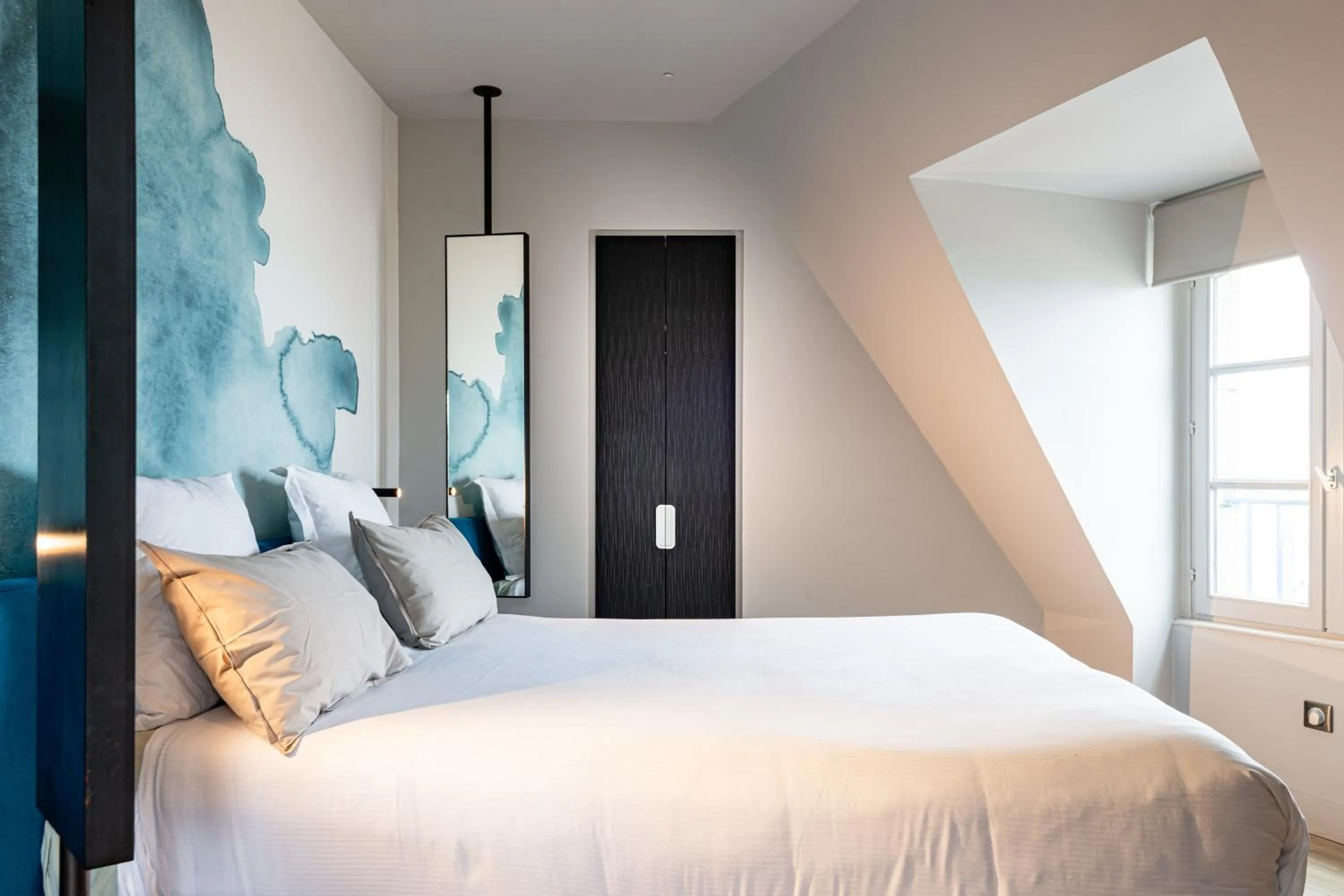 Bed in Hôtel de la Cité