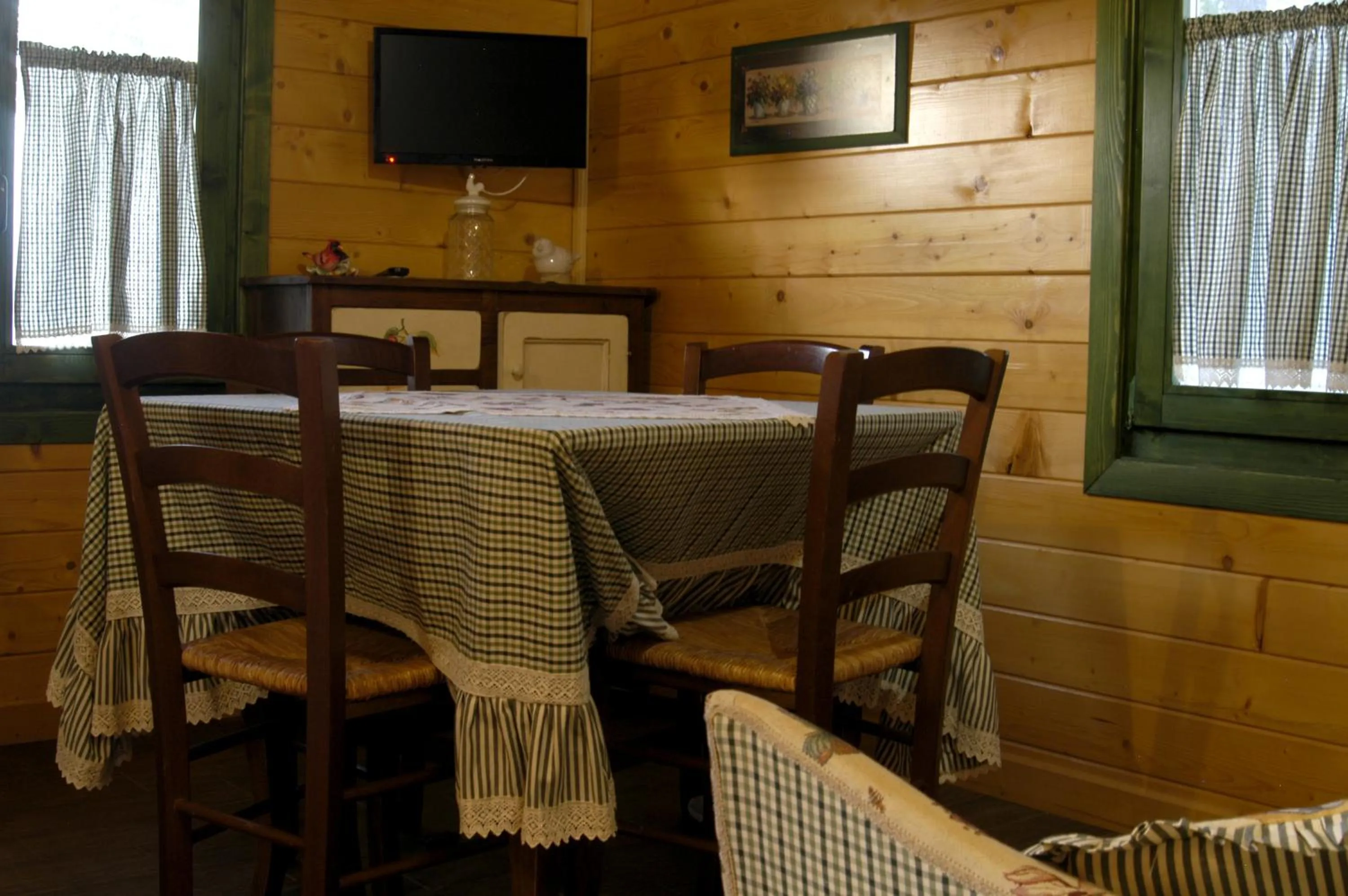 Communal lounge/ TV room in Bosco D'Olmi Country House