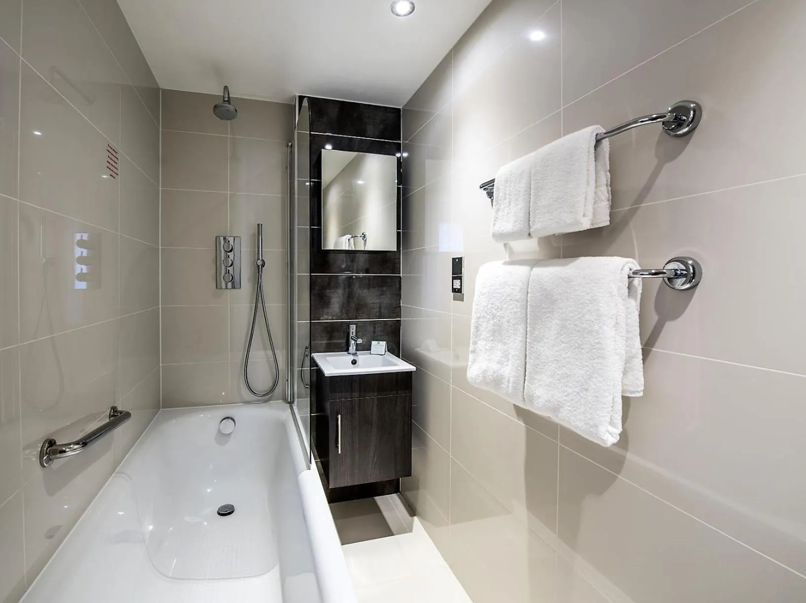 Bathroom in Holiday Inn London Kensington High St. by IHG