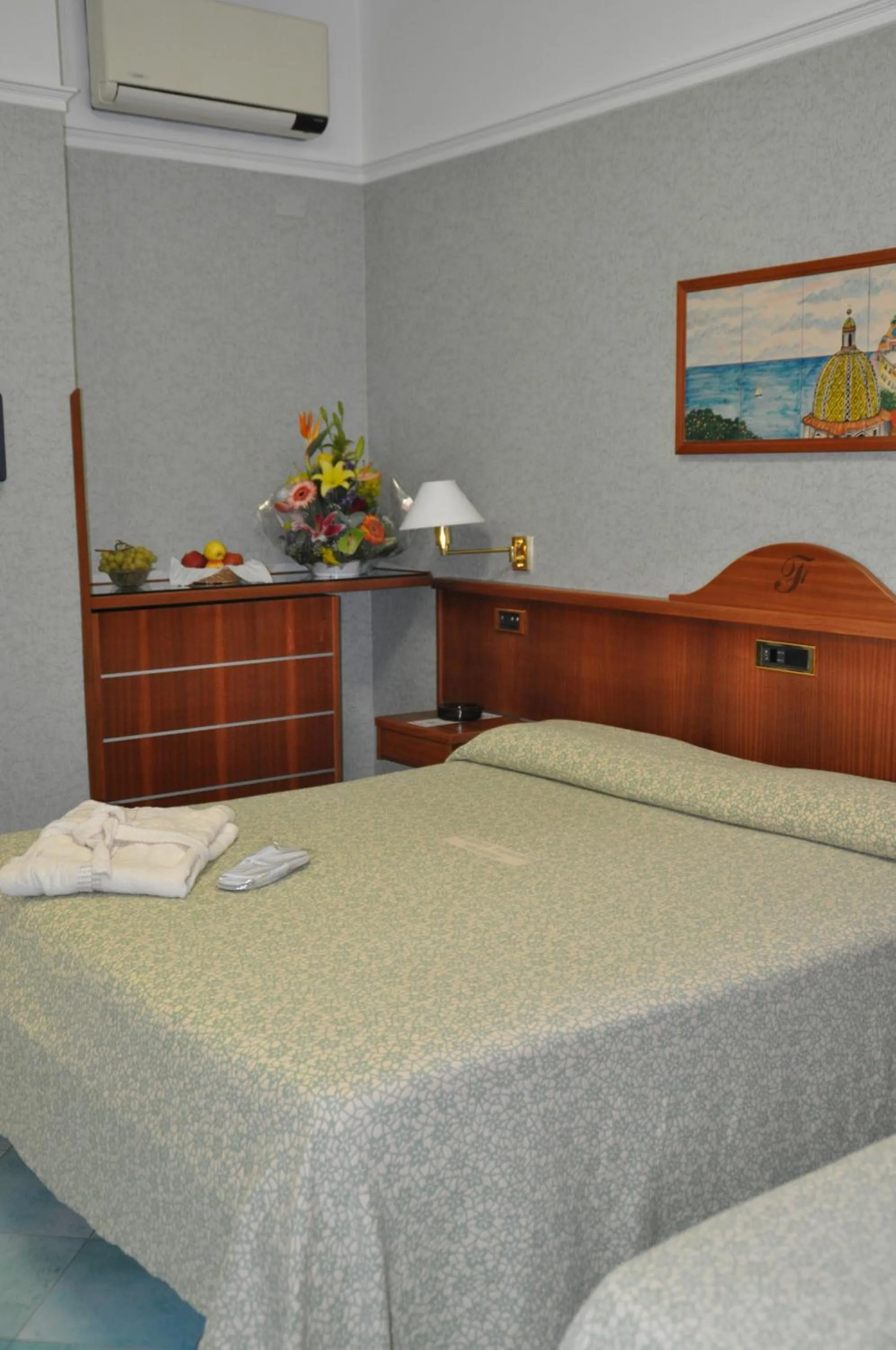 Bed in Albergo Fiorenza