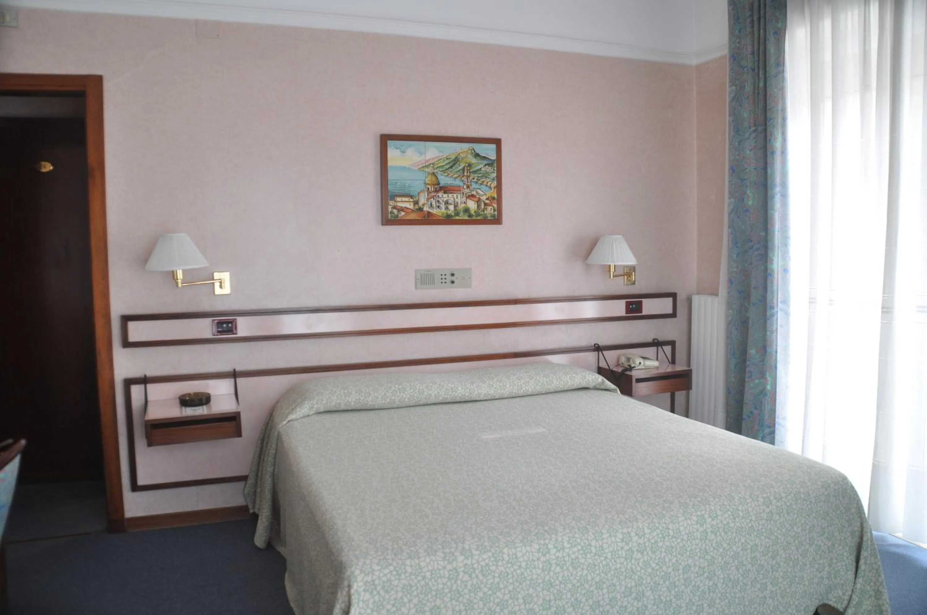 Bed in Albergo Fiorenza