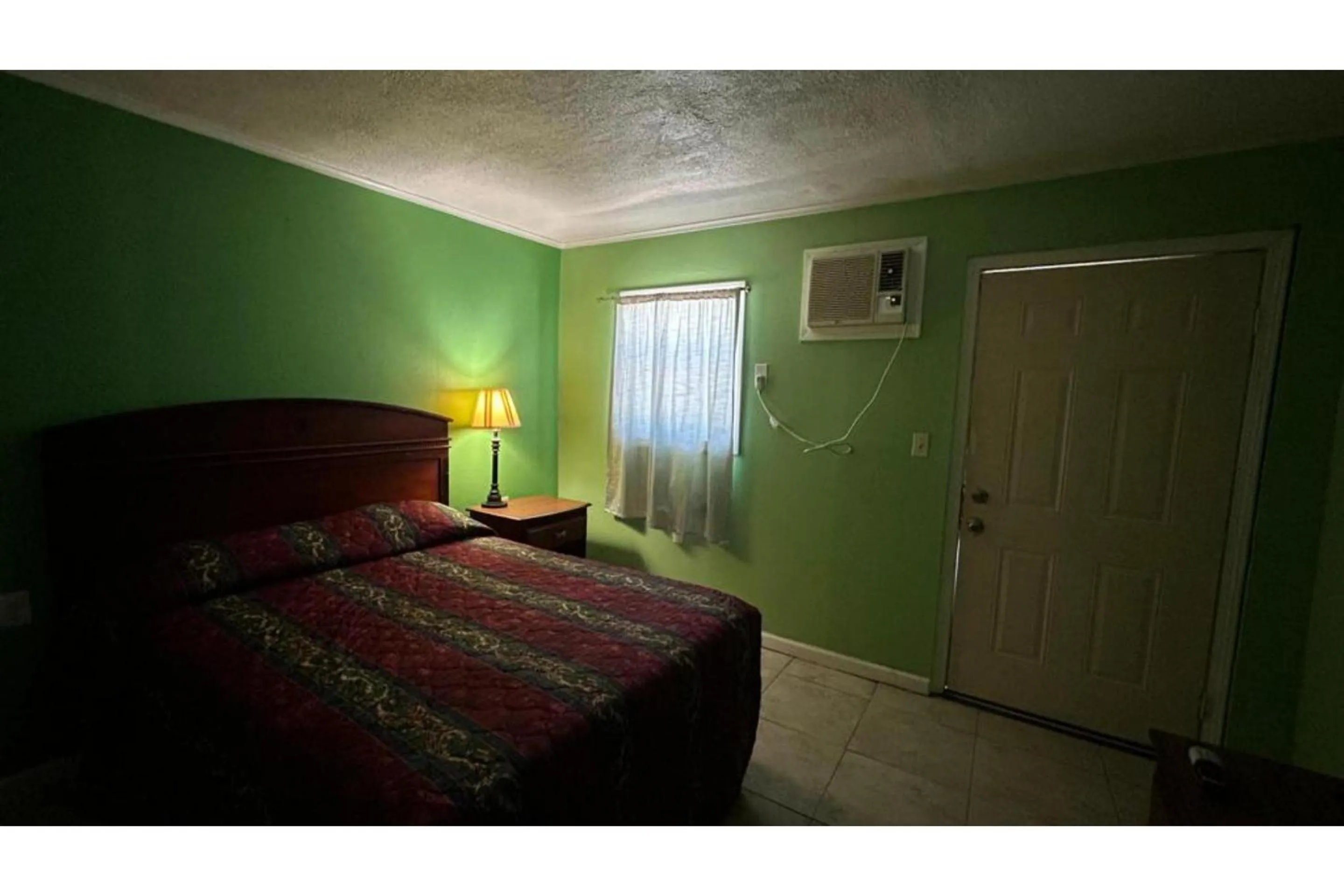 Bedroom, Bed in Monterrey Motel Padre Island, Corpus Christi BY OYO