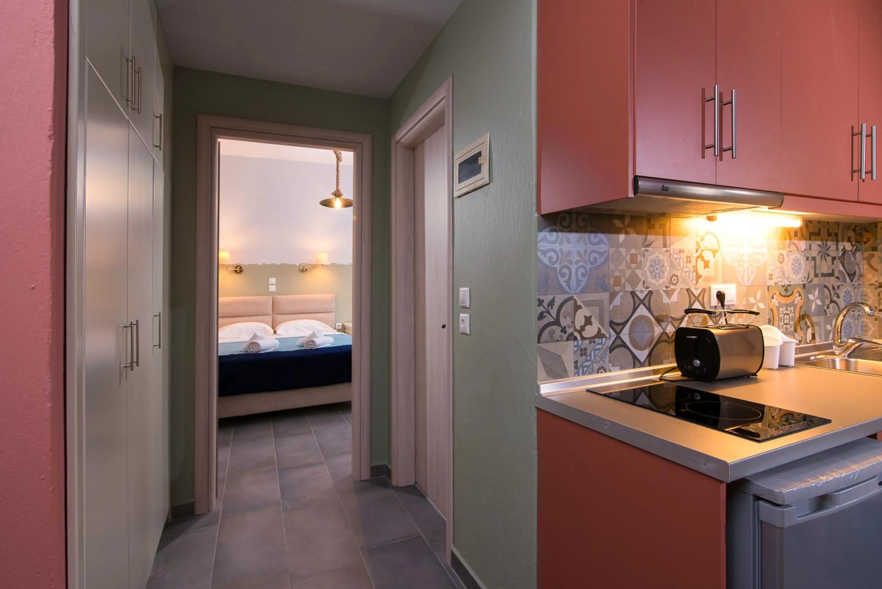 Kitchen or kitchenette, Bed in Hotel Pegasus-Adult Friendly