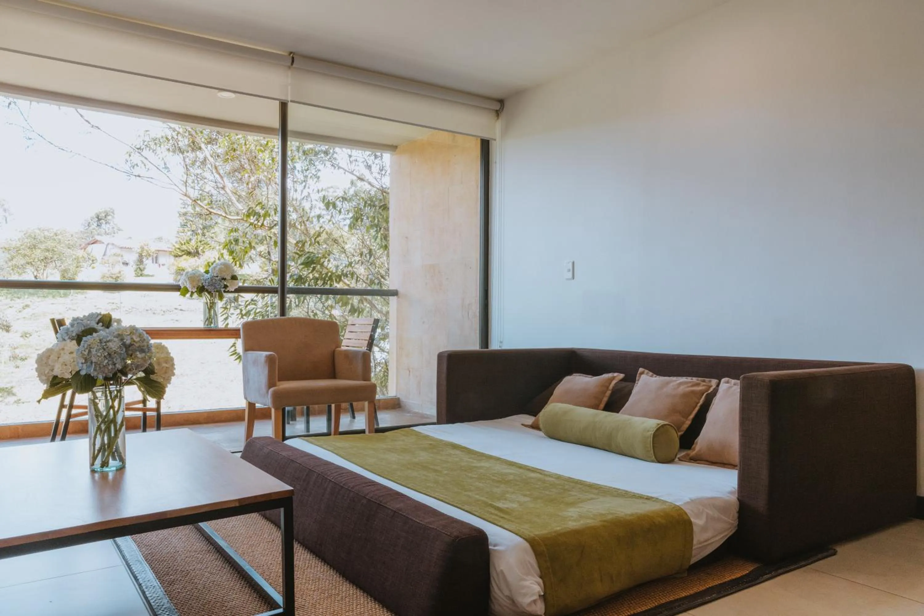 Photo of the whole room, Bed in Travelers Rio Verde Living Suites