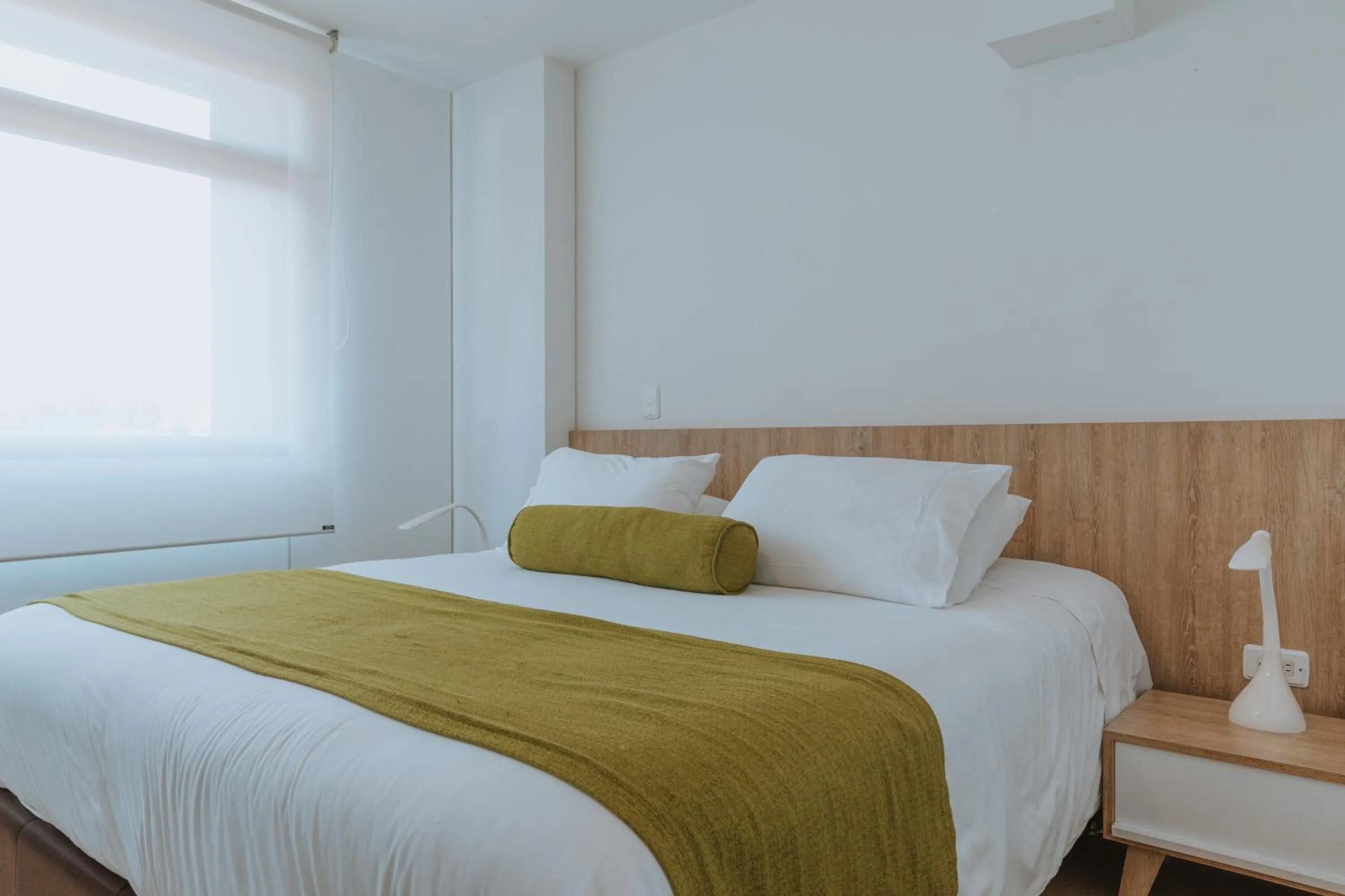 Bed in Travelers Rio Verde Living Suites