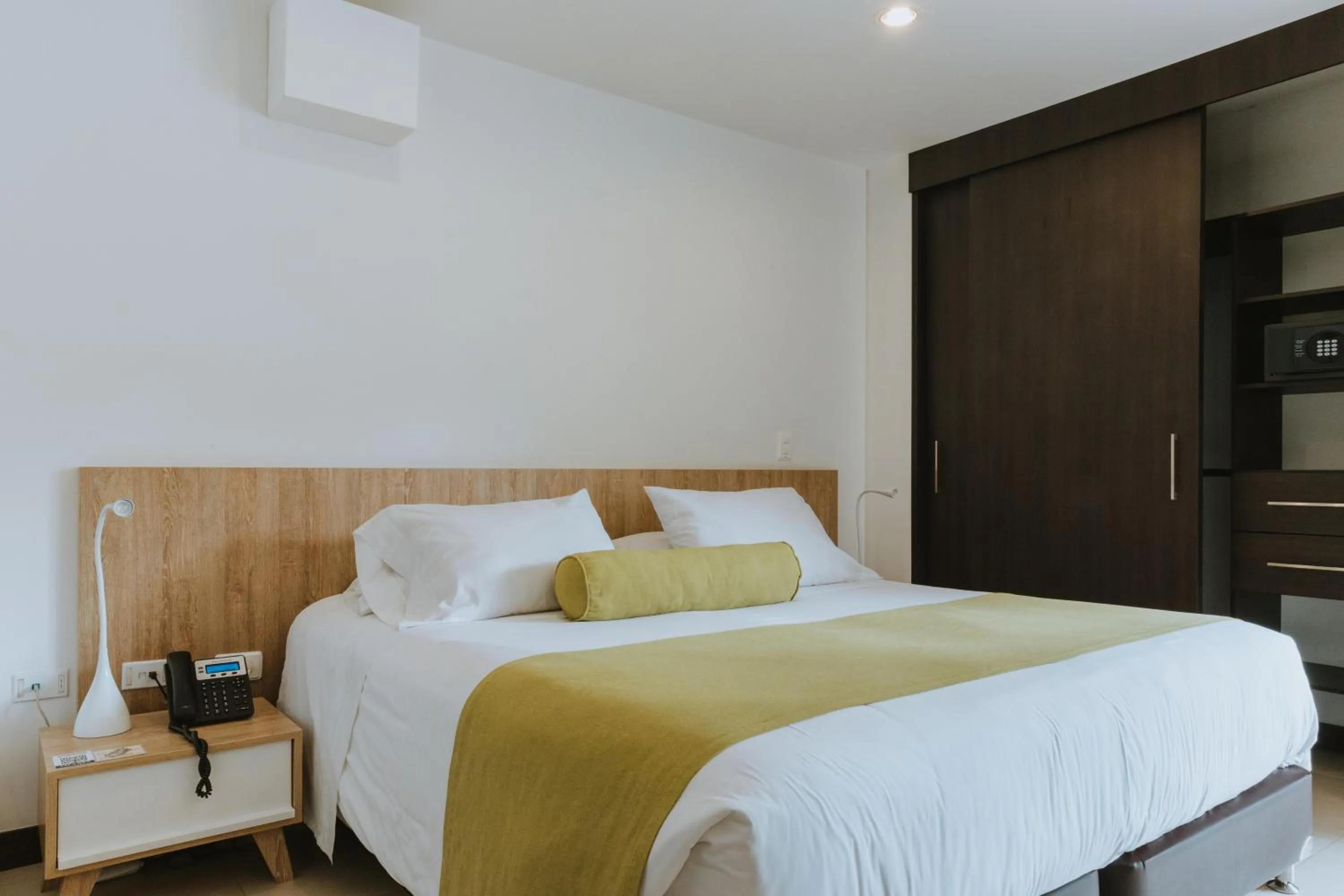 Bed in Travelers Rio Verde Living Suites