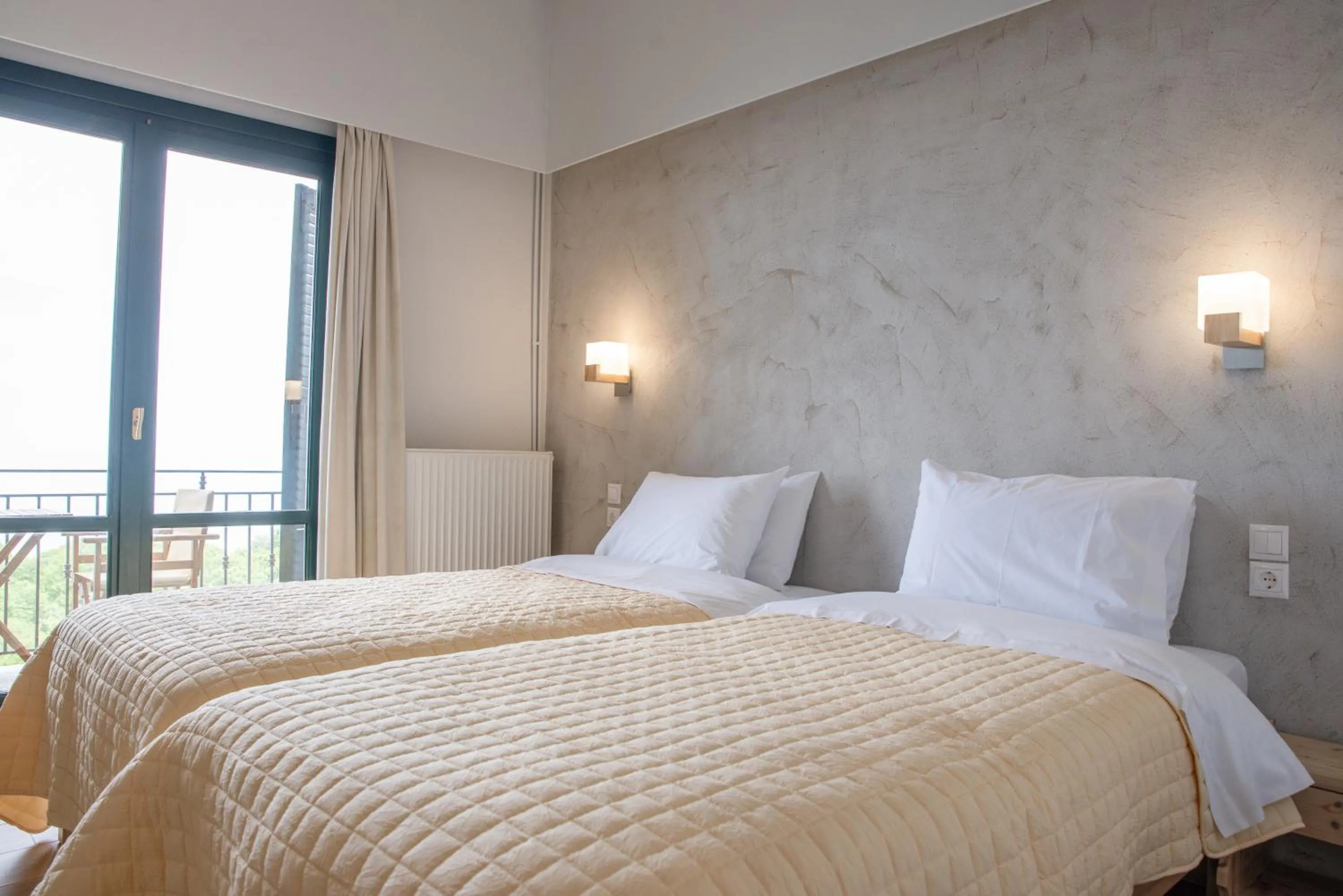 Bed in Marabou Hotel Chorefto