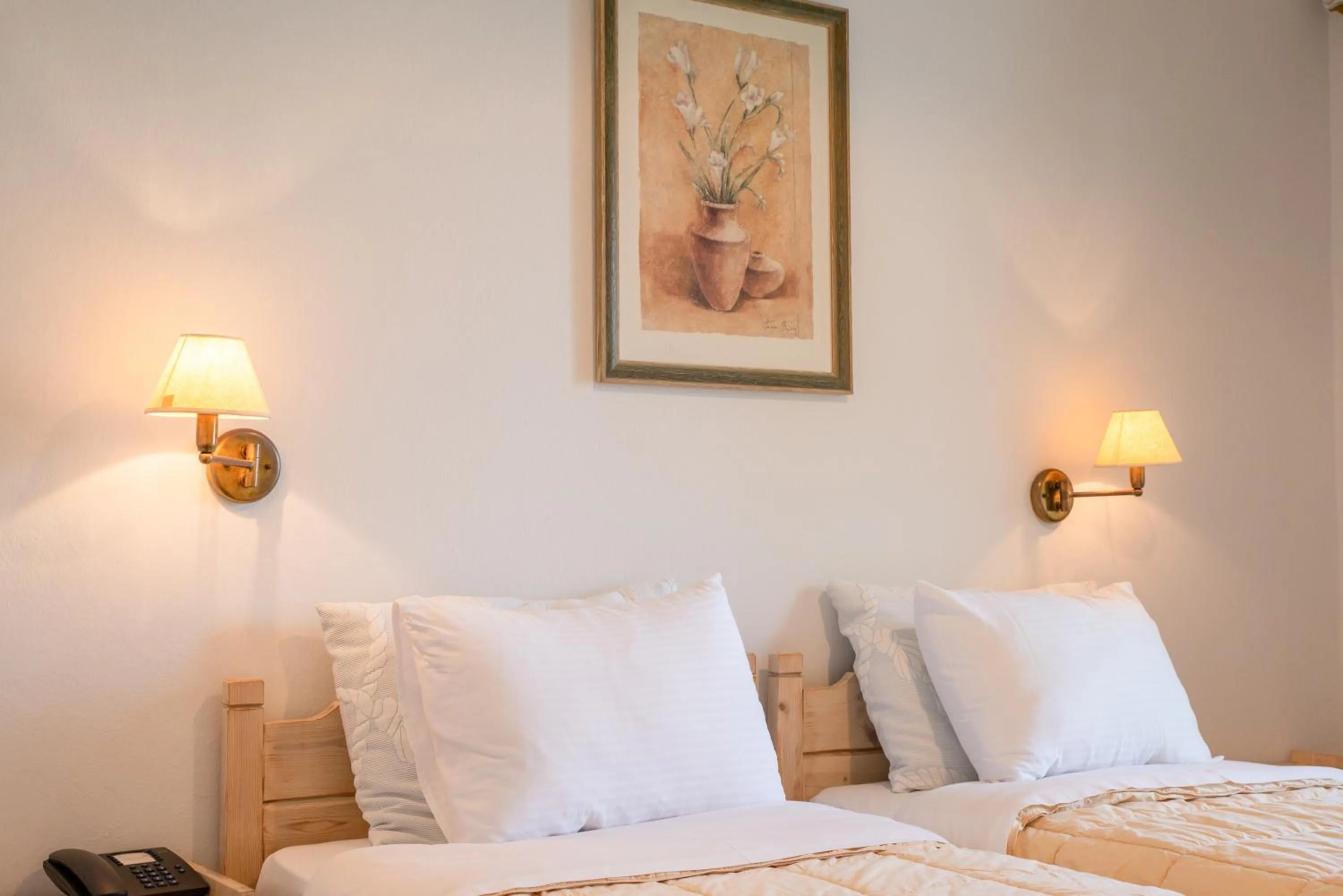 Bed in Marabou Hotel Chorefto