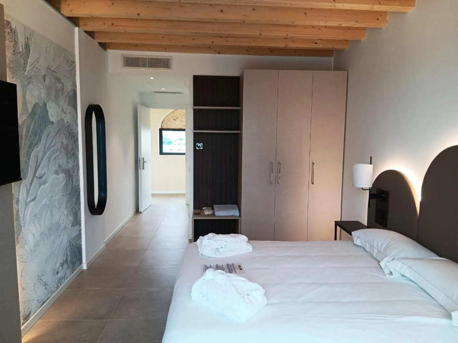 Bed in Villa Luisa Resort & Luxury Apartments