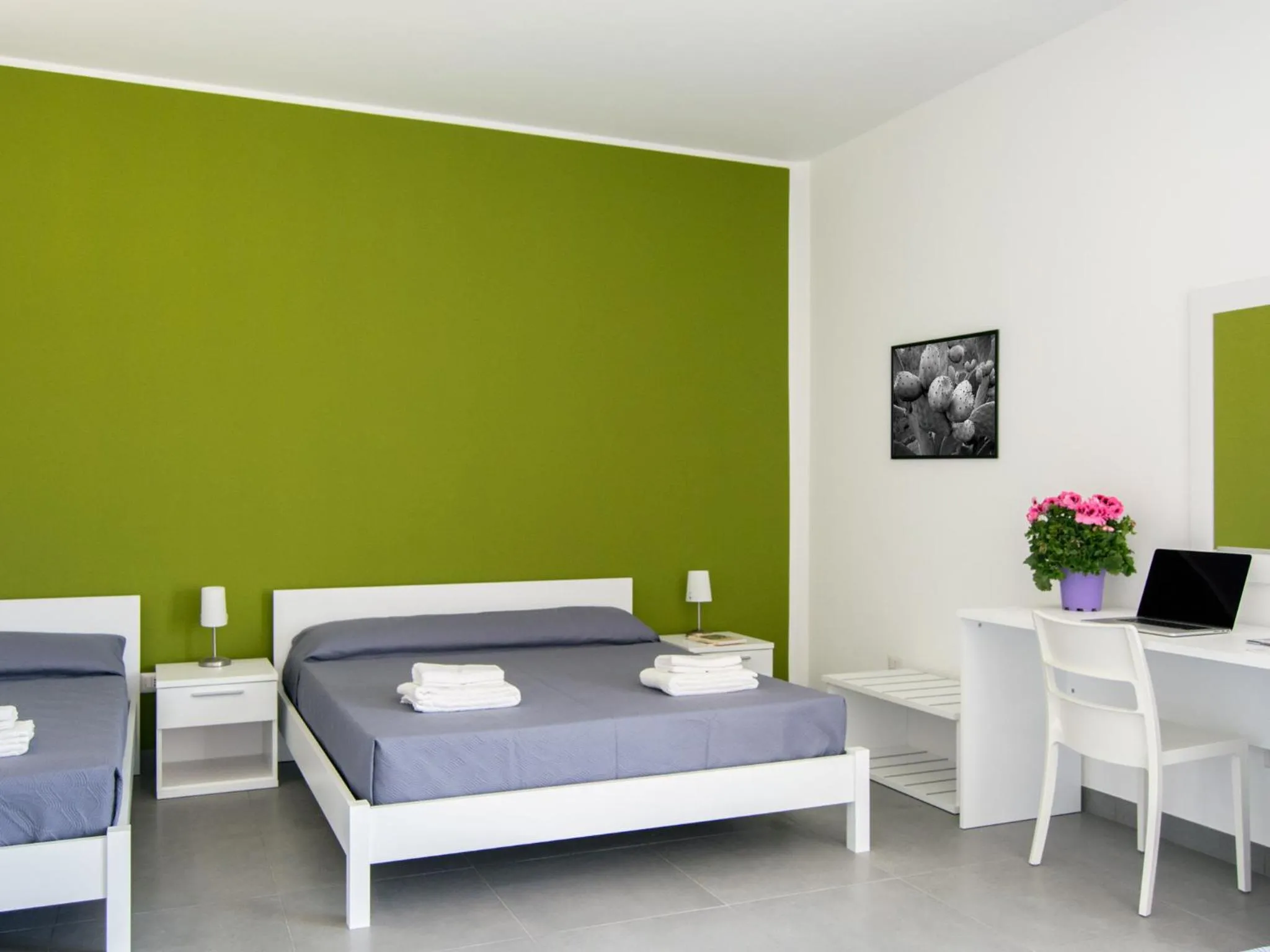 Quadruple Room with Balcony in Ermes