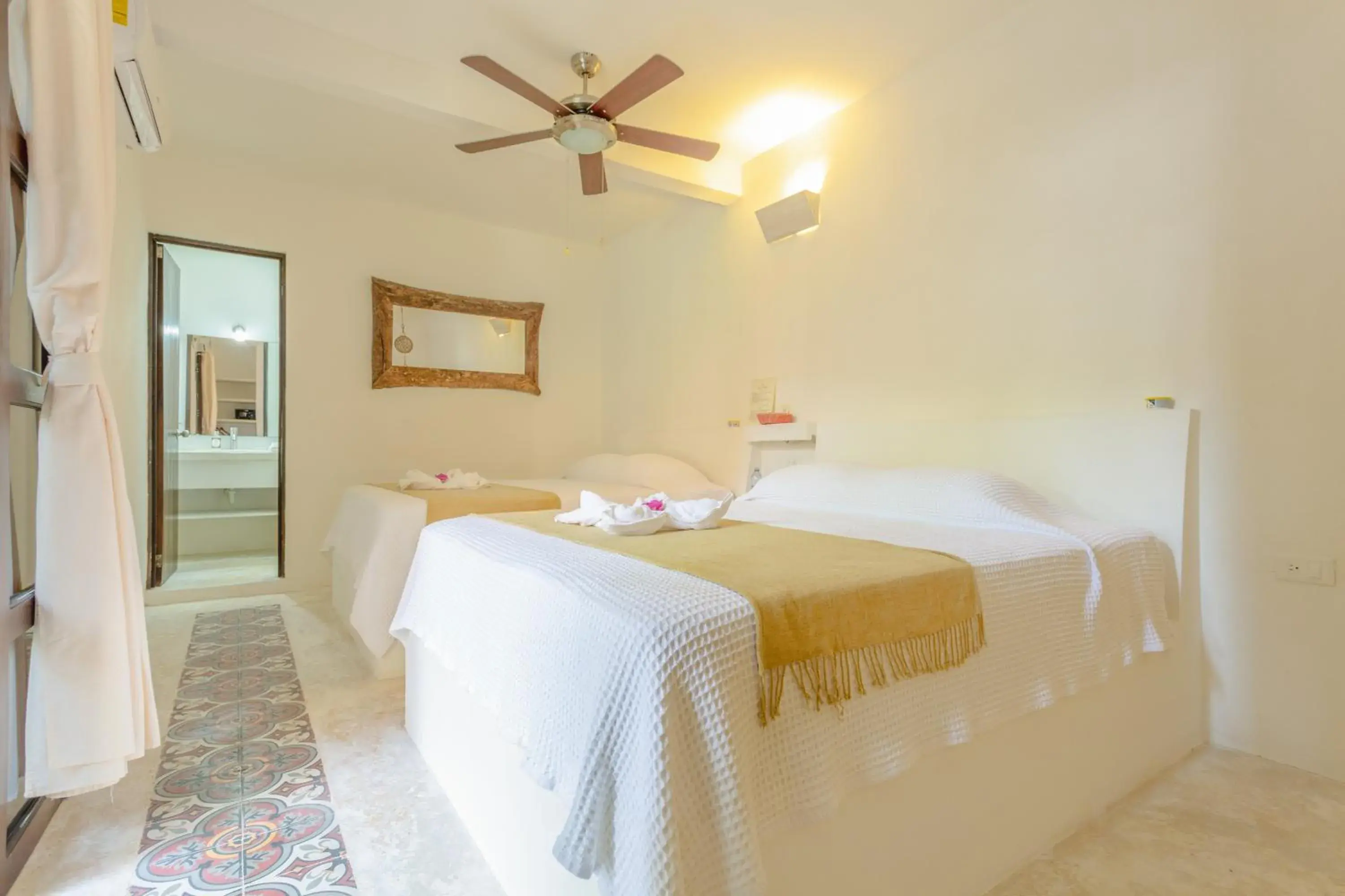 Bed in Kin Ha Tulum Hotel Bed in Kin Ha Tulum Hotel