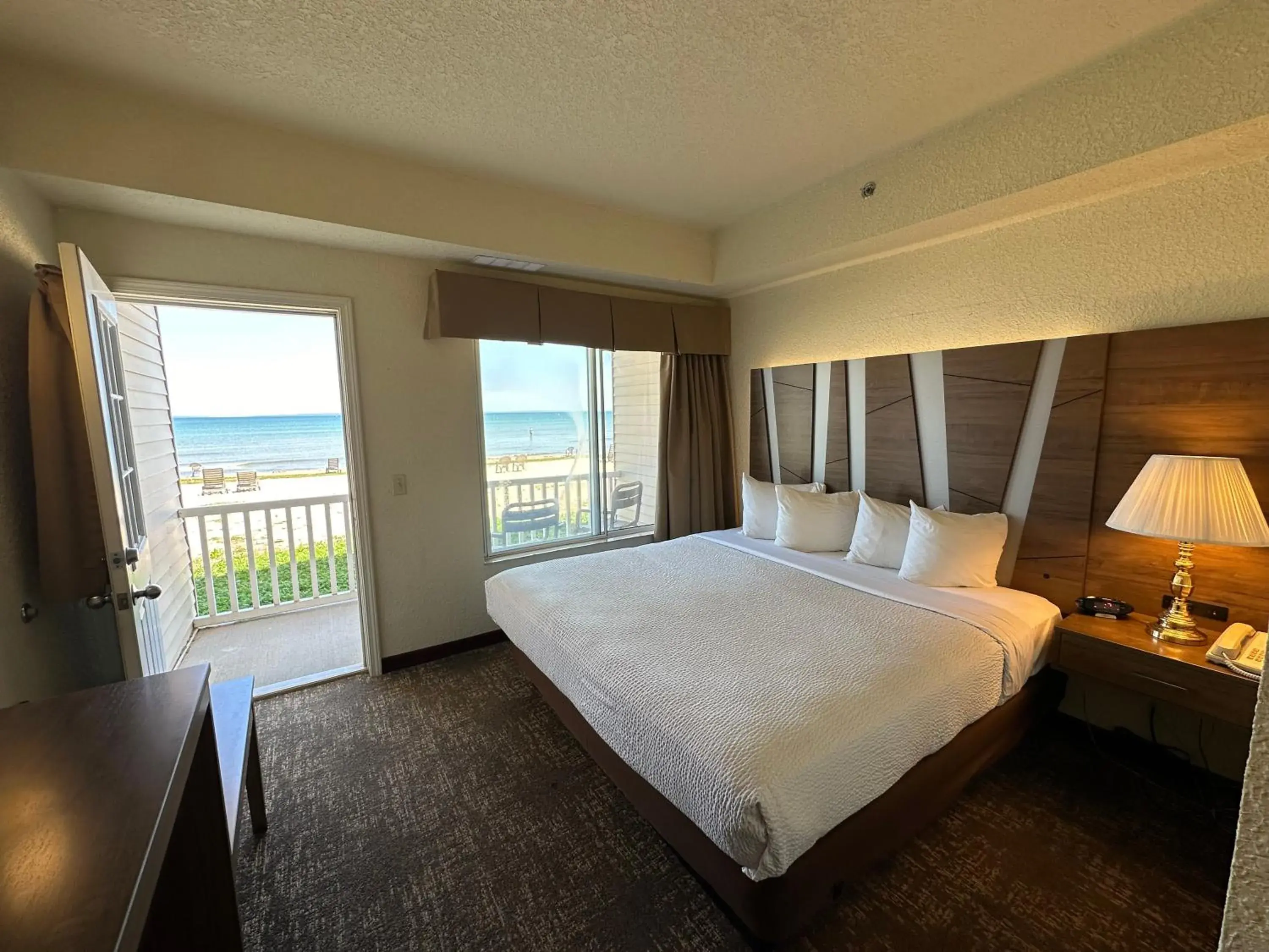 View (from property/room), Bed in Mackinaw Beach and Bay Inn & Suites View (from property/room), Bed in Mackinaw Beach and Bay Inn & Suites