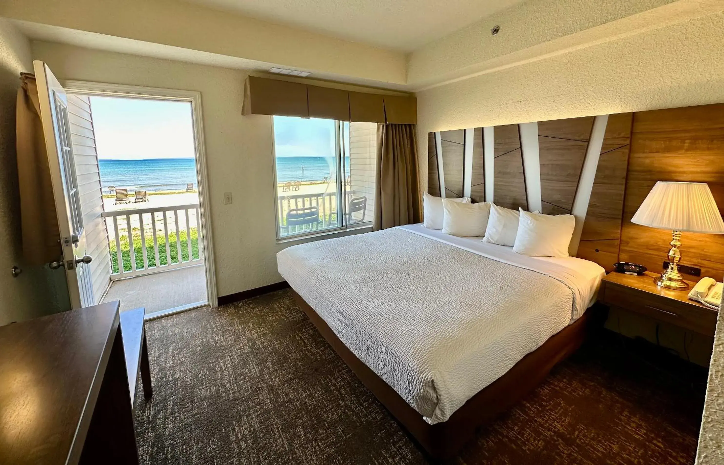 View (from property/room), Bed in Mackinaw Beach and Bay Inn & Suites View (from property/room), Bed in Mackinaw Beach and Bay Inn & Suites