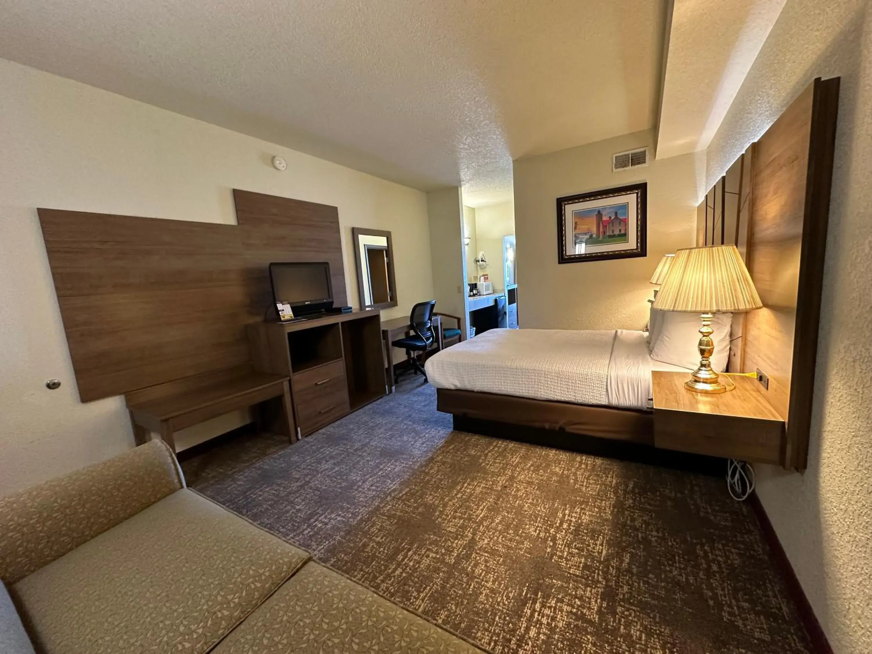 Bed in Mackinaw Beach and Bay Inn & Suites Bed in Mackinaw Beach and Bay Inn & Suites