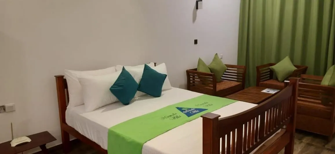 Bed in Nirmala Villa