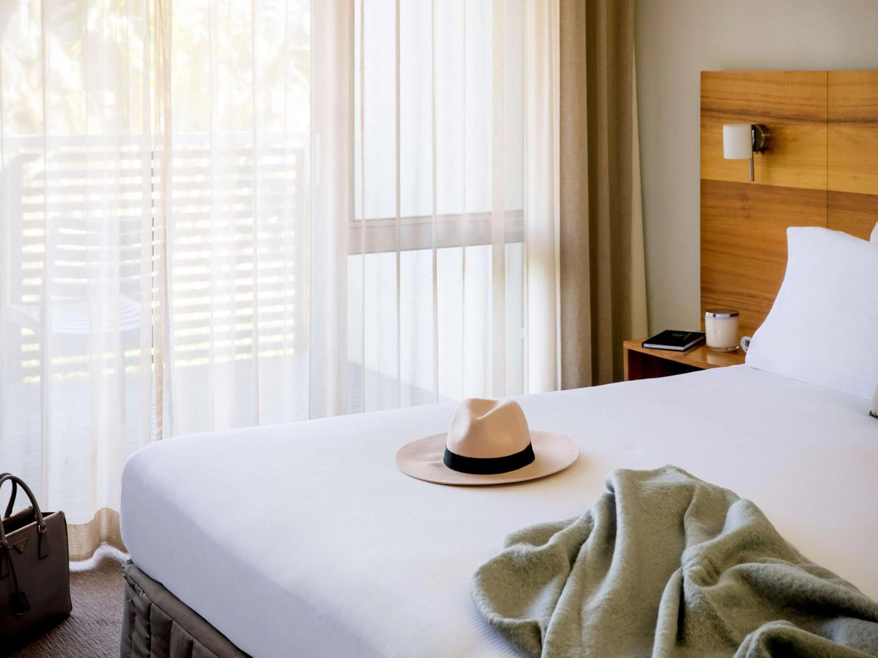 Photo of the whole room, Bed in Pullman Magenta Shores Resort