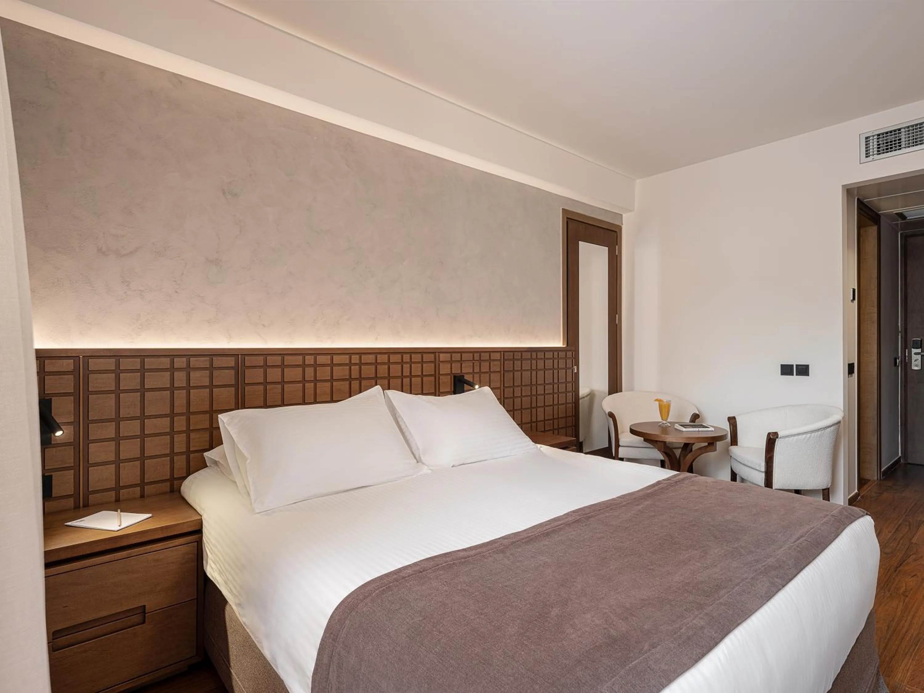 Bed in Civitel Akali Hotel