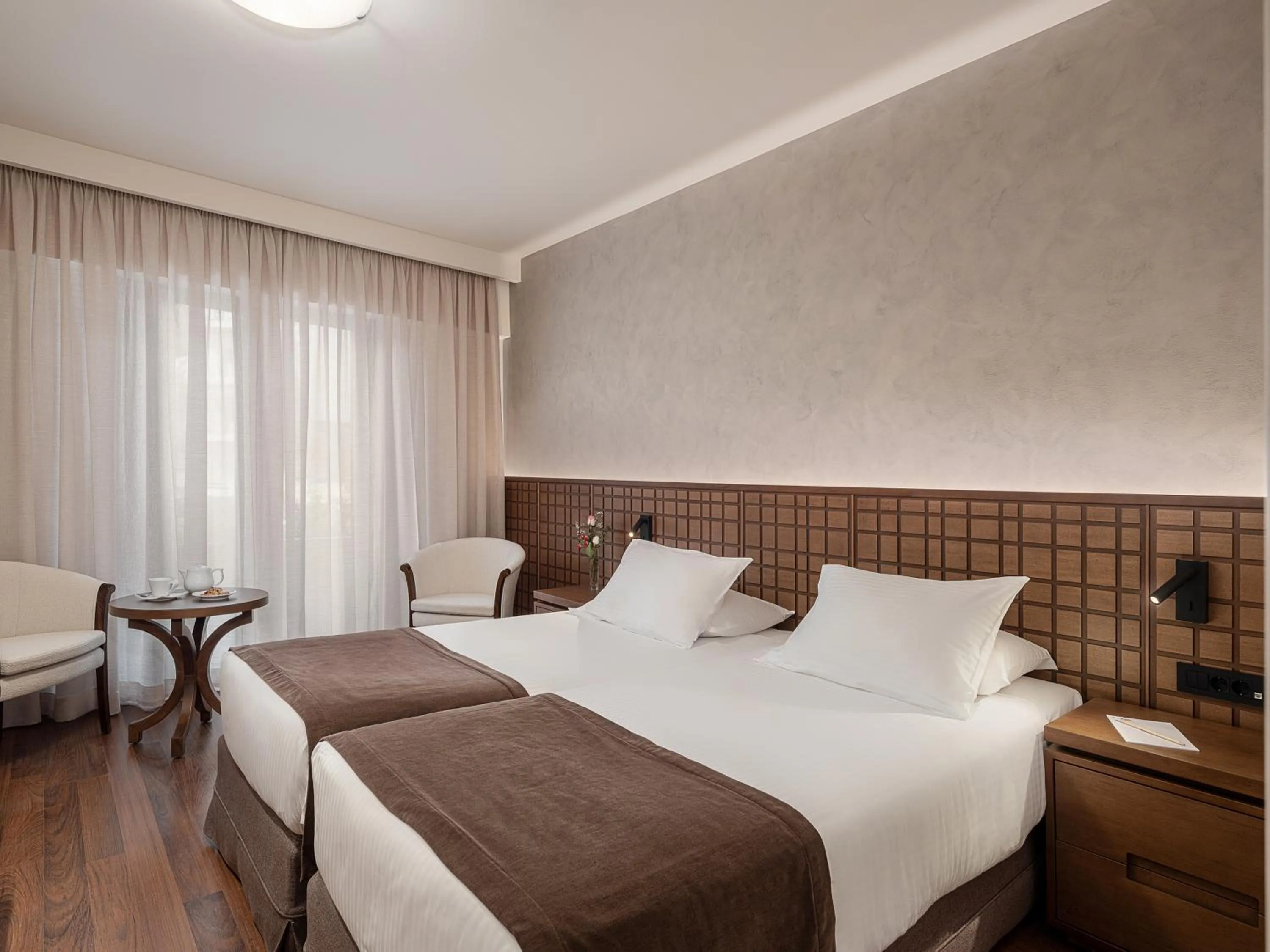 Bed in Civitel Akali Hotel