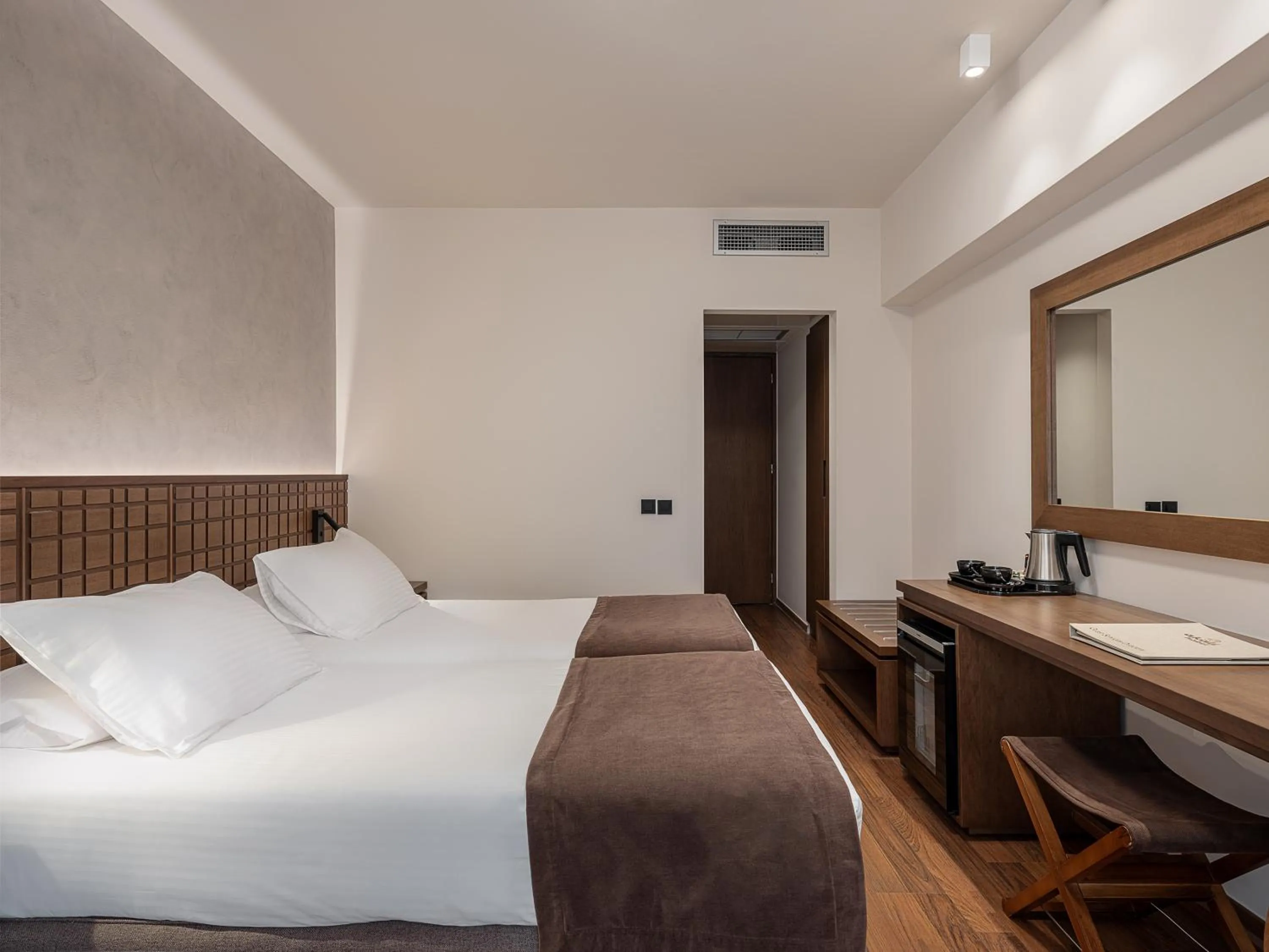 Bed in Civitel Akali Hotel