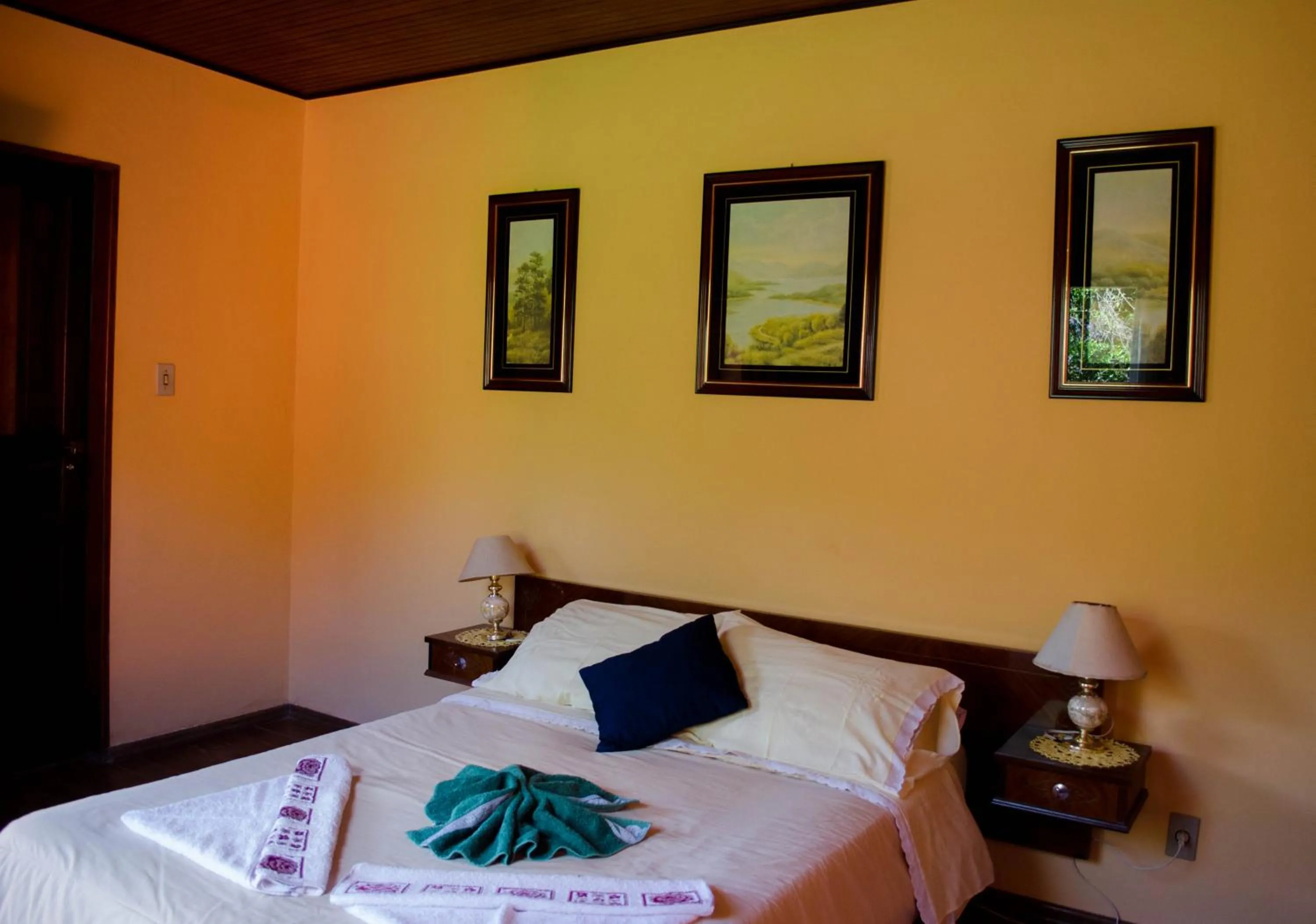 Bed in Pousada Pedra da Gávea