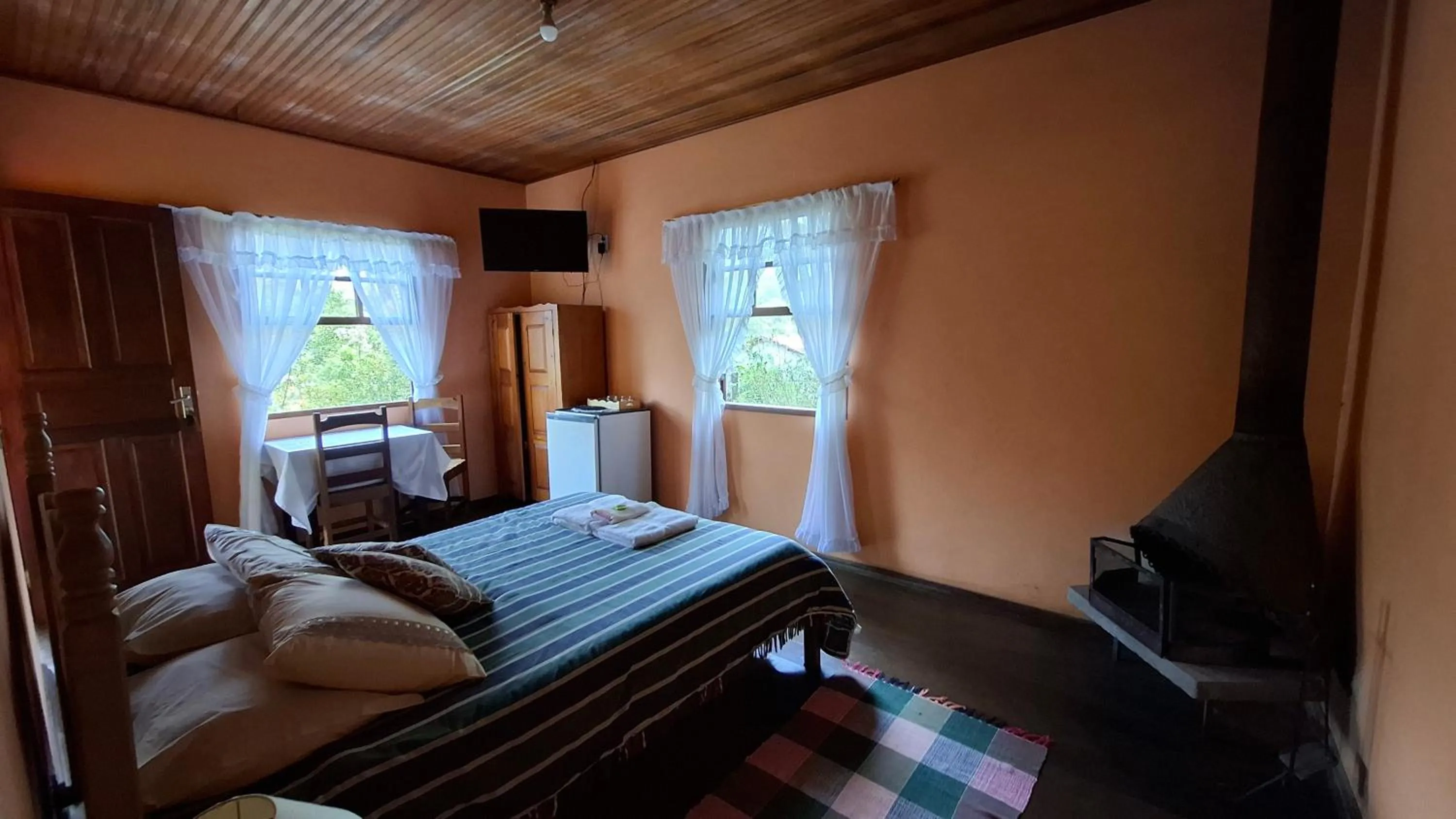 Bed in Pousada Pedra da Gávea