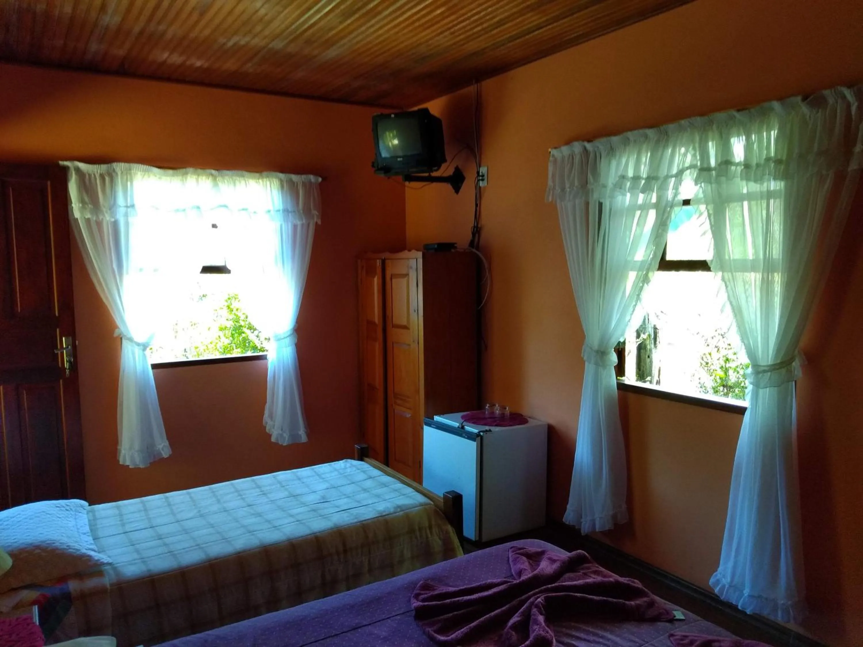 Bed in Pousada Pedra da Gávea