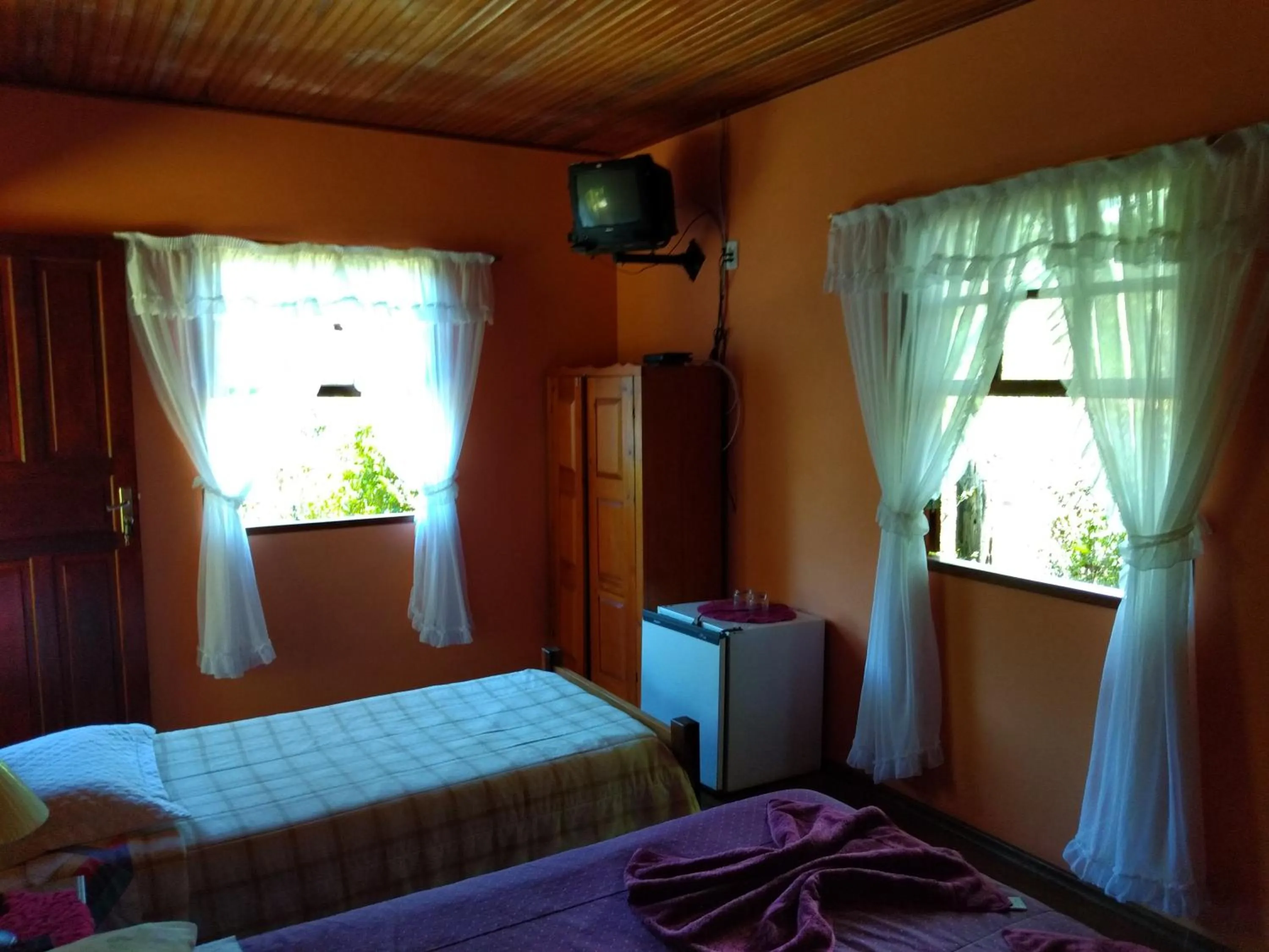 Bed in Pousada Pedra da Gávea