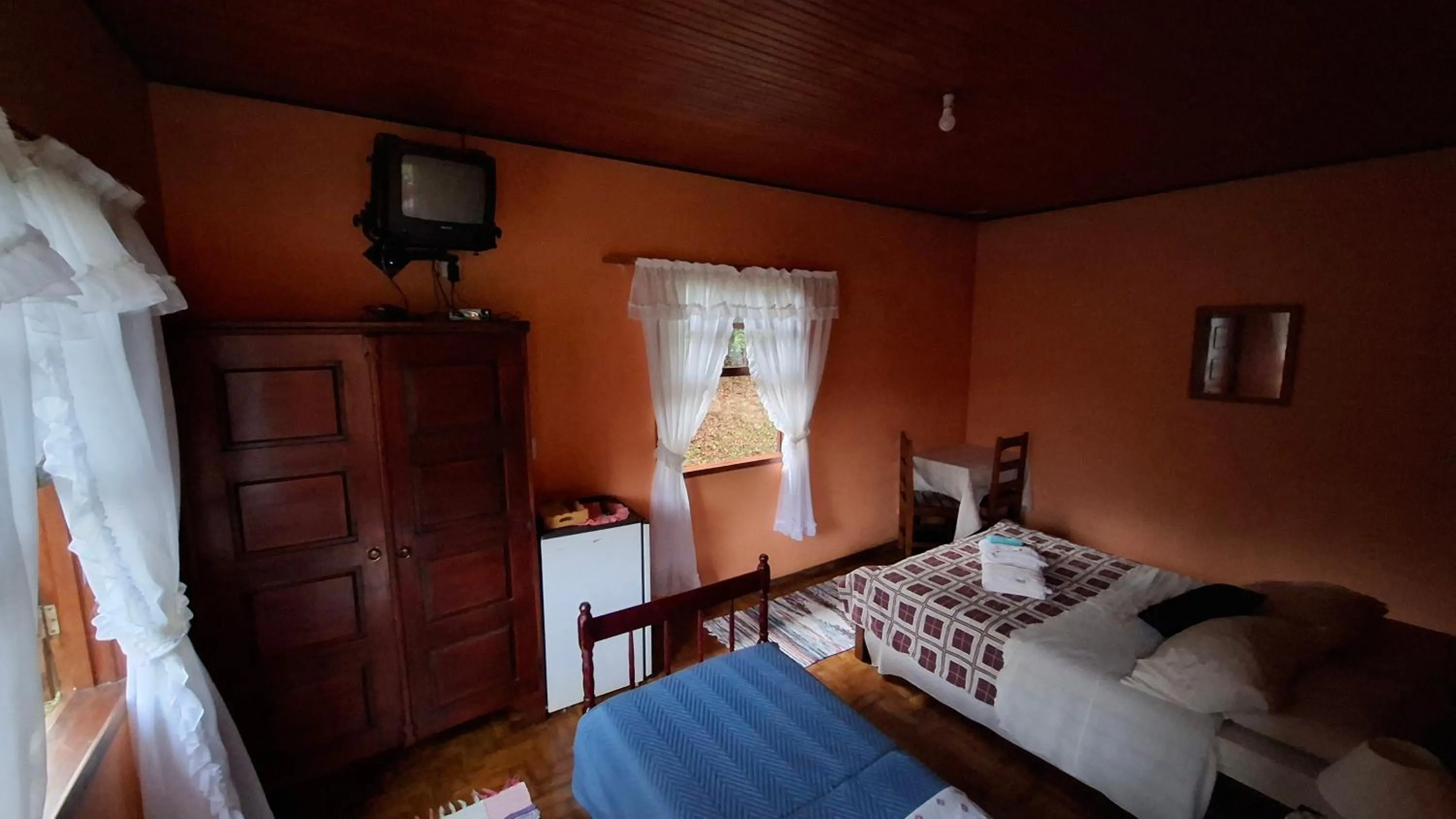 Bed in Pousada Pedra da Gávea