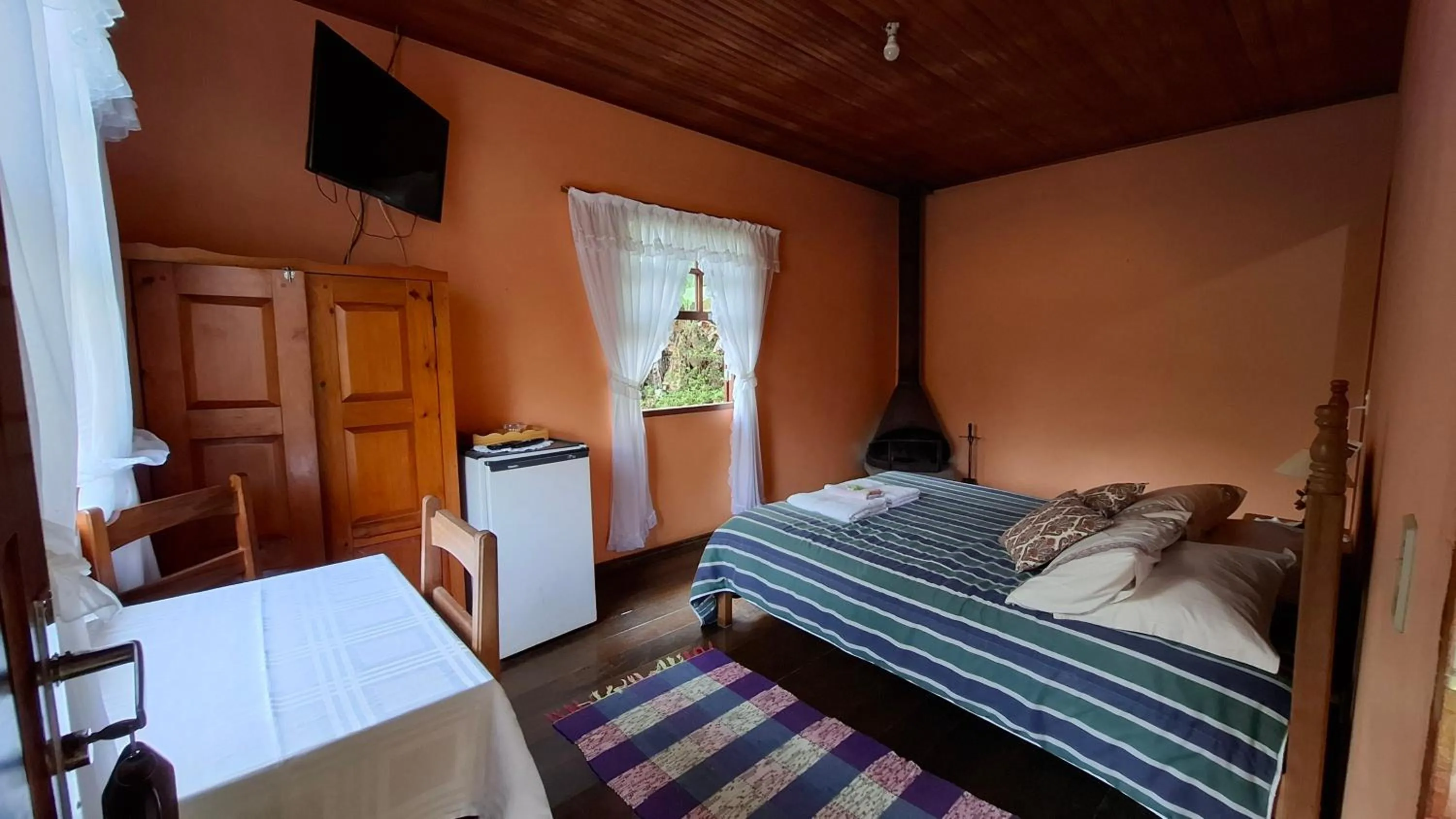 Bed in Pousada Pedra da Gávea