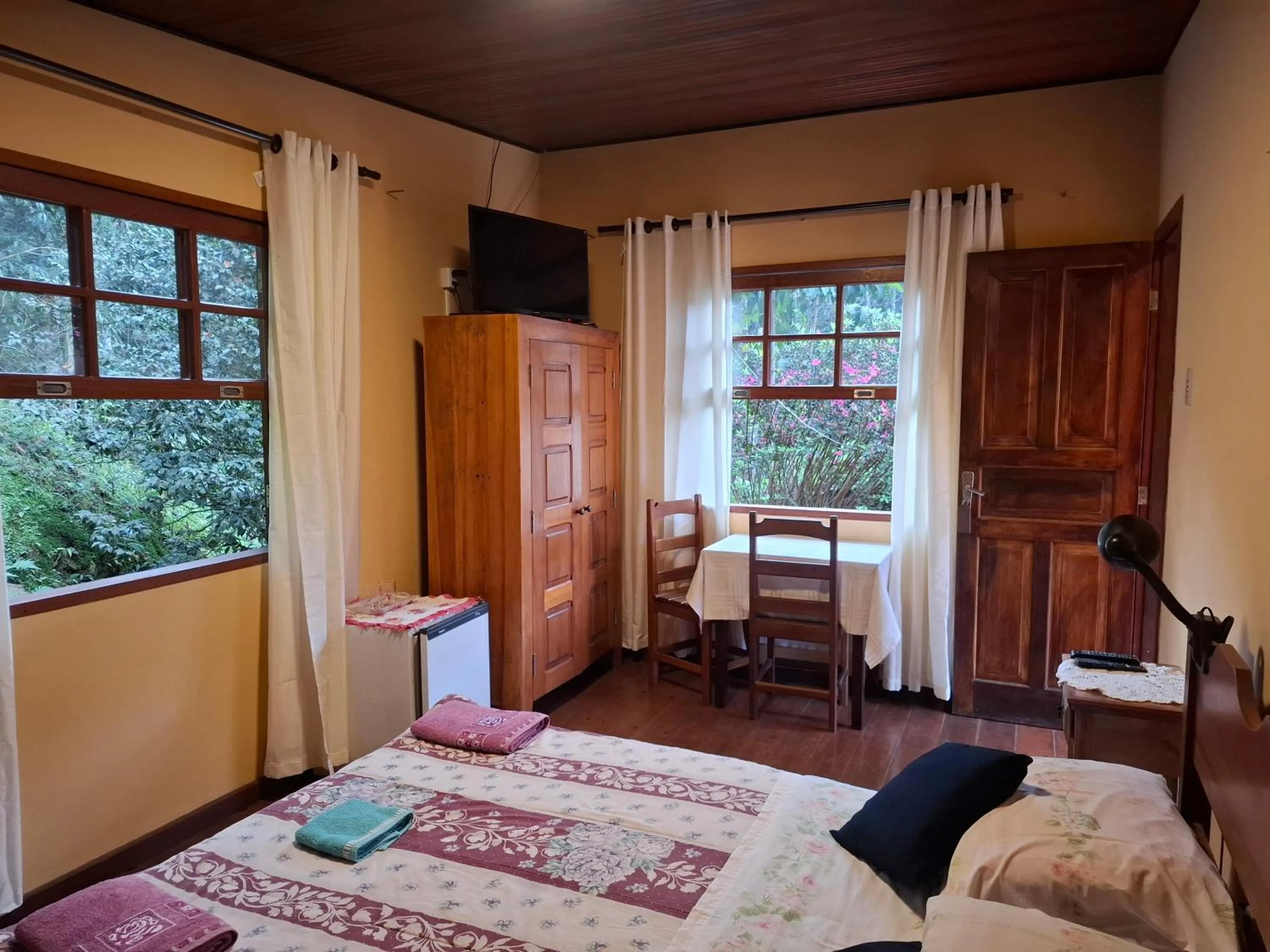 Bed in Pousada Pedra da Gávea