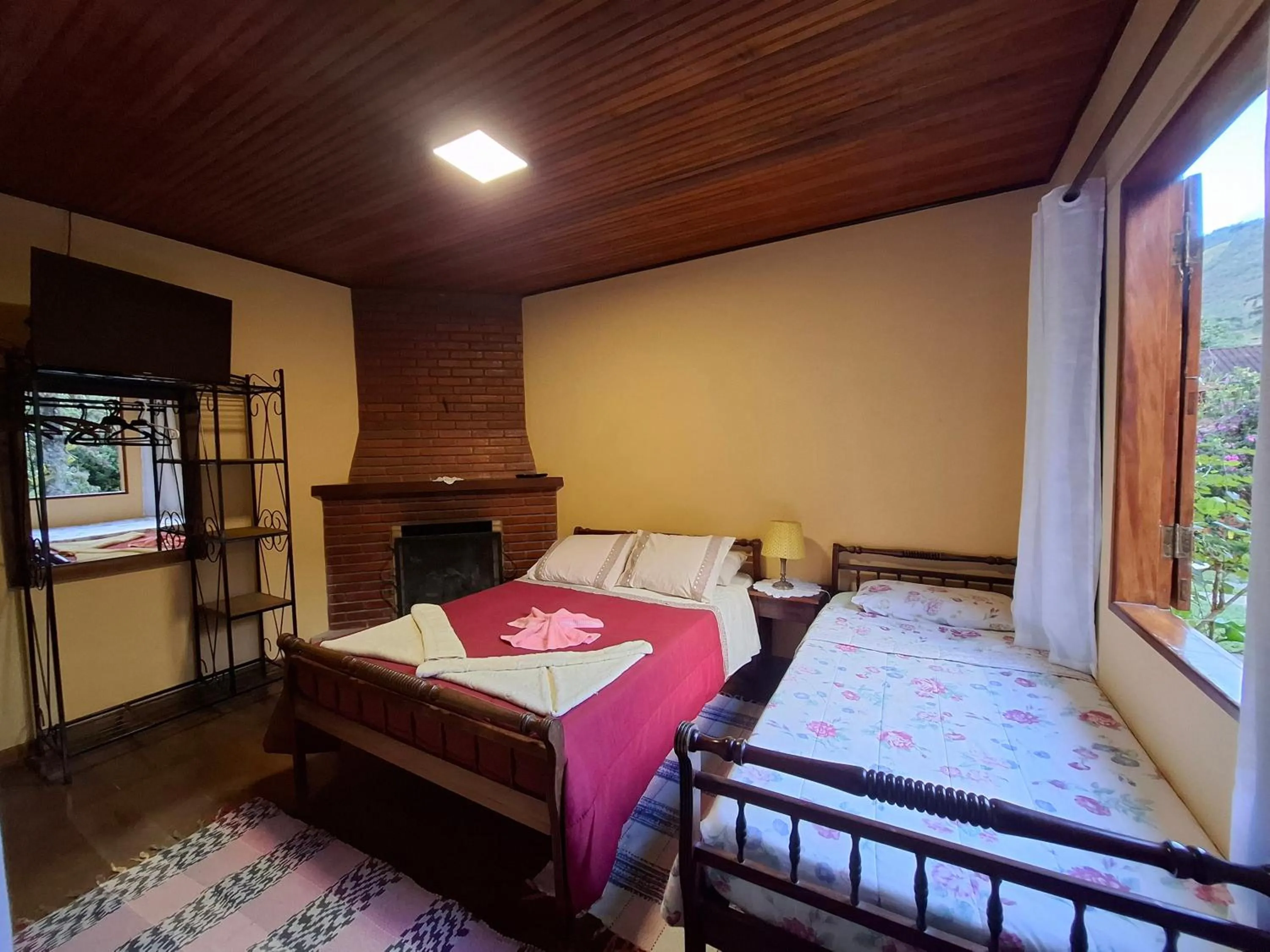 Bed in Pousada Pedra da Gávea