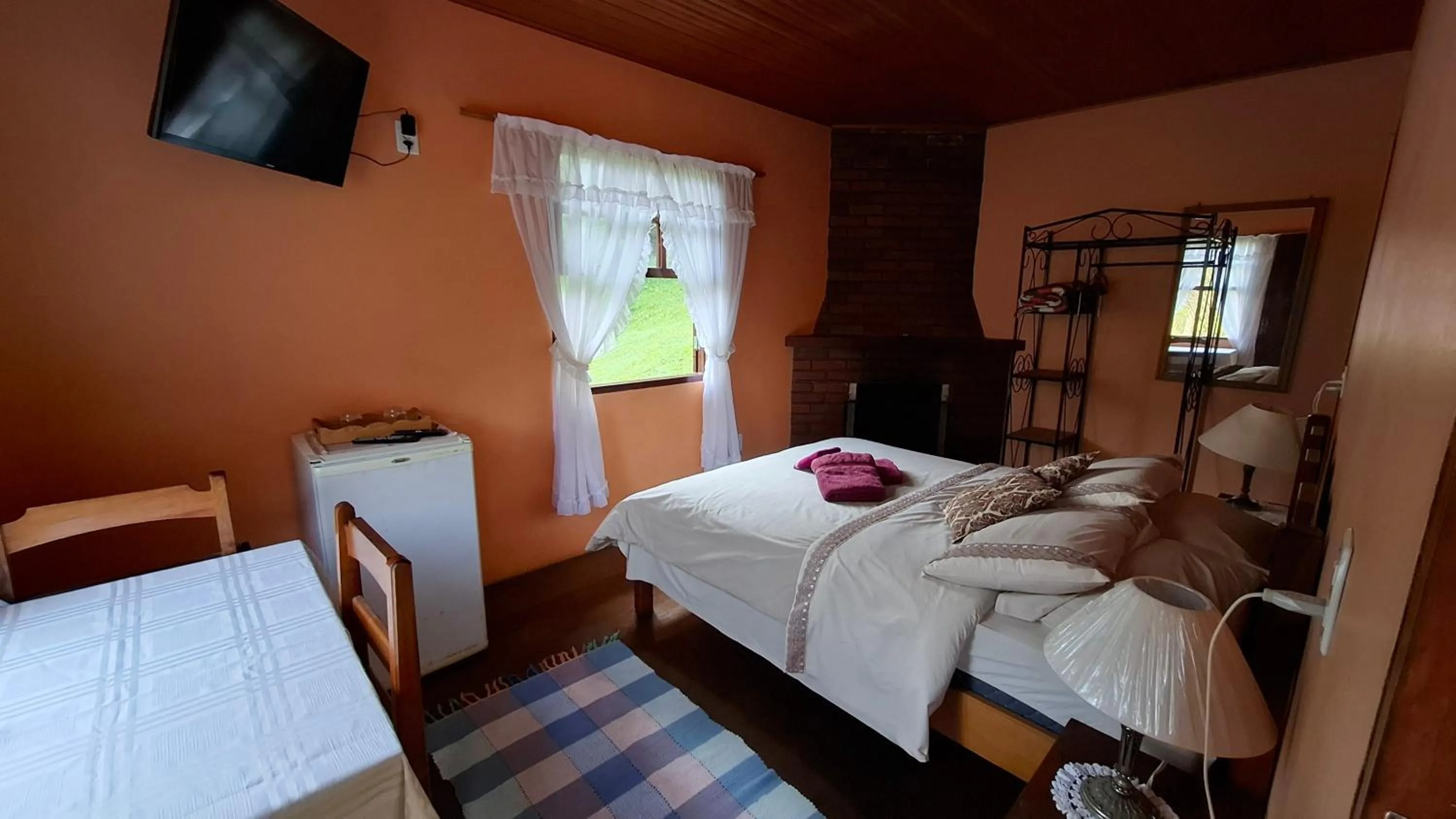 Bed in Pousada Pedra da Gávea